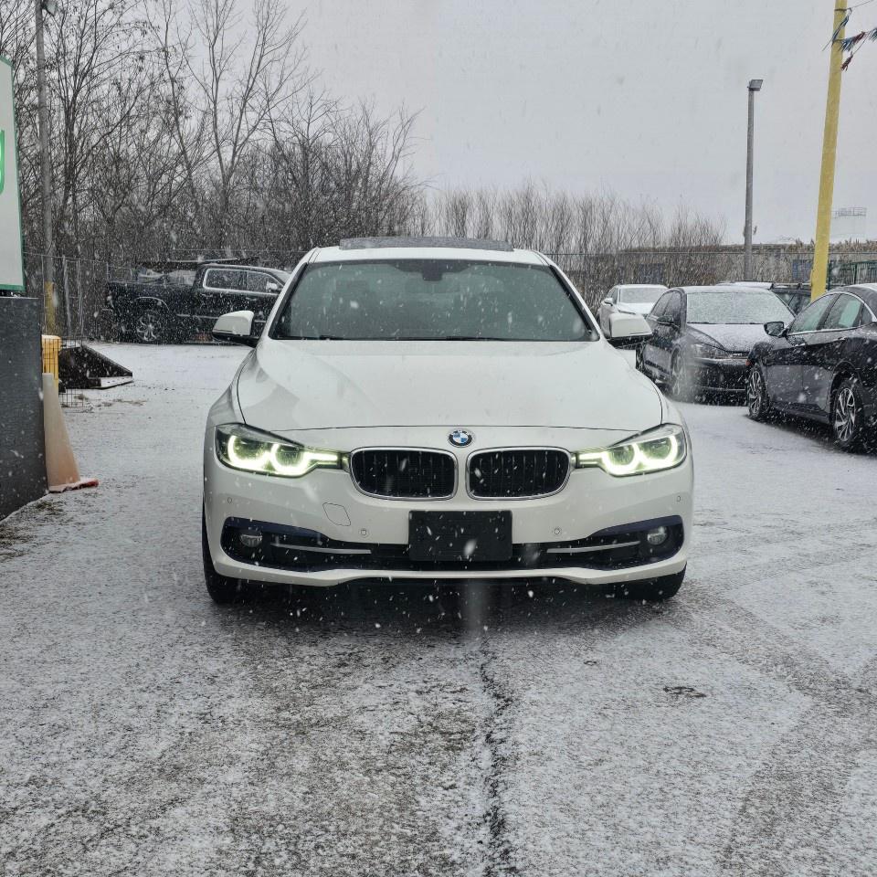 2017 BMW 3 Series 4dr Sdn 330i xDrive AWD Photo