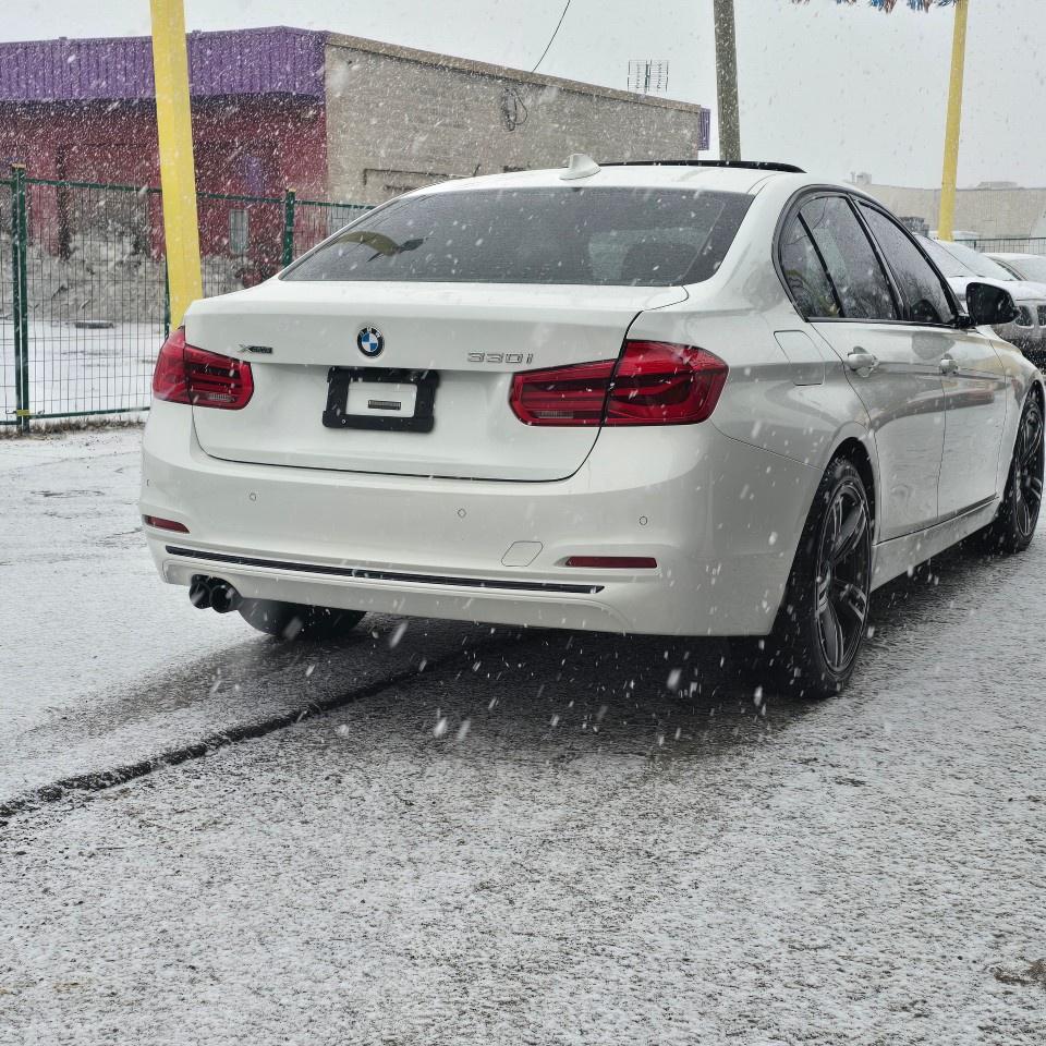 2017 BMW 3 Series 4dr Sdn 330i xDrive AWD Photo