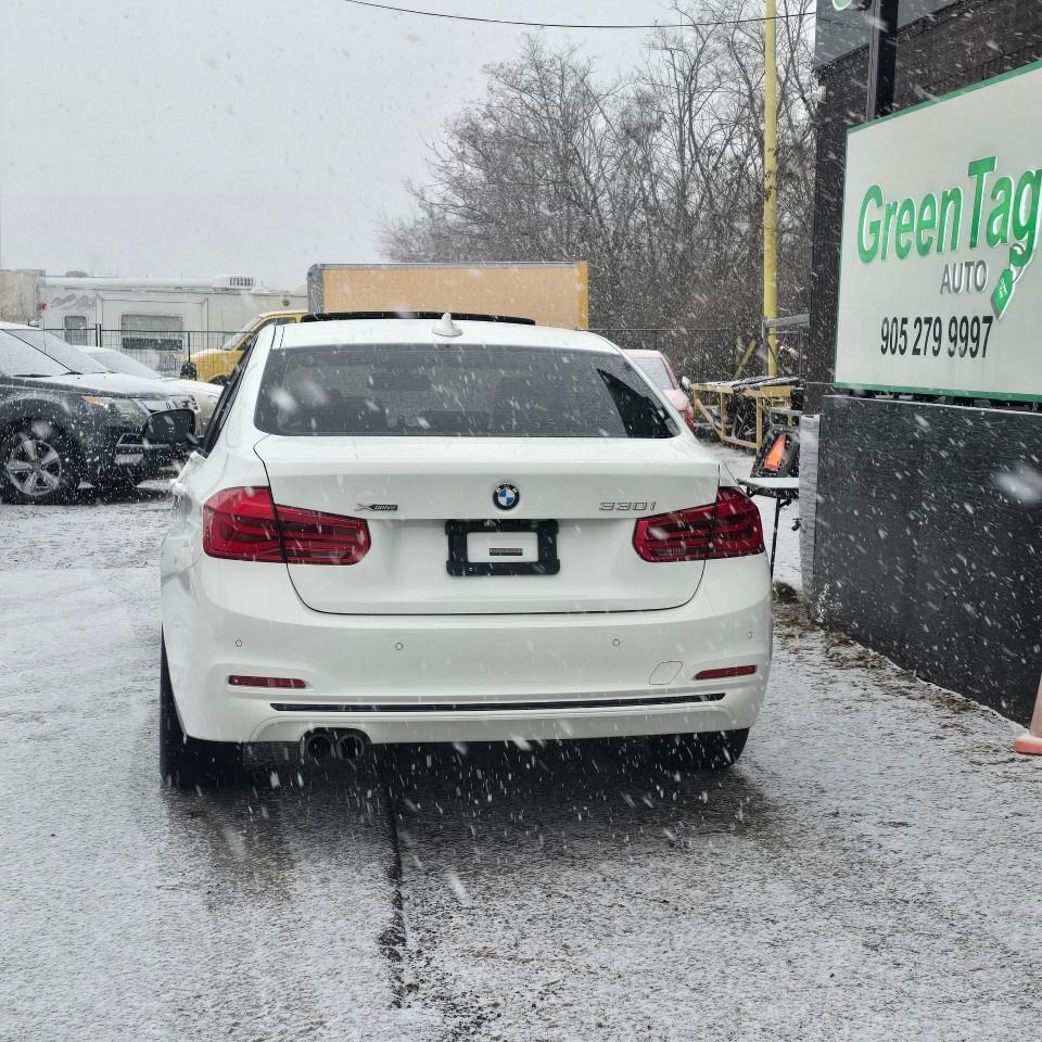 2017 BMW 3 Series 4dr Sdn 330i xDrive AWD Photo