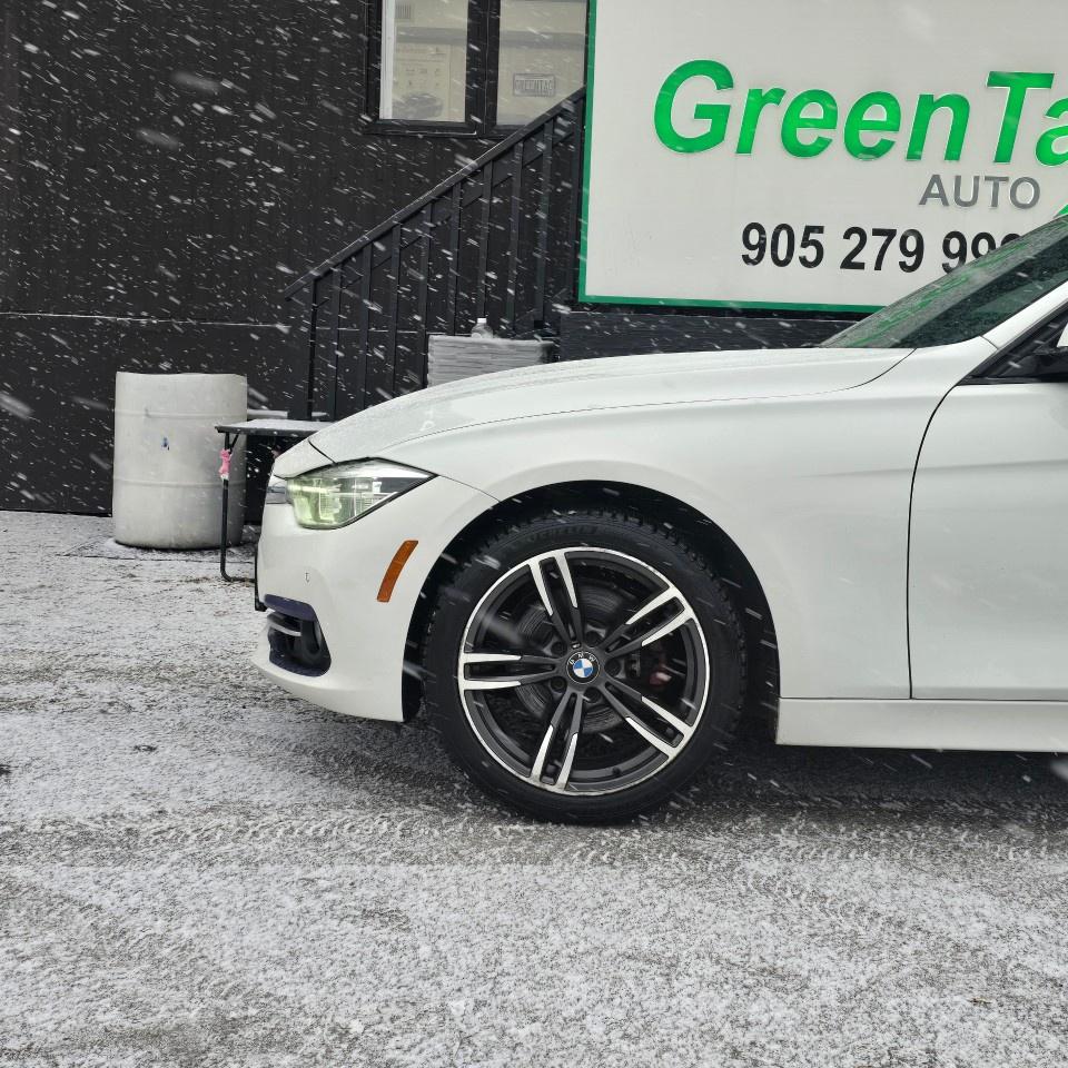 2017 BMW 3 Series 4dr Sdn 330i xDrive AWD Photo