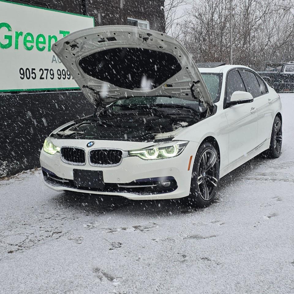 2017 BMW 3 Series 4dr Sdn 330i xDrive AWD Photo