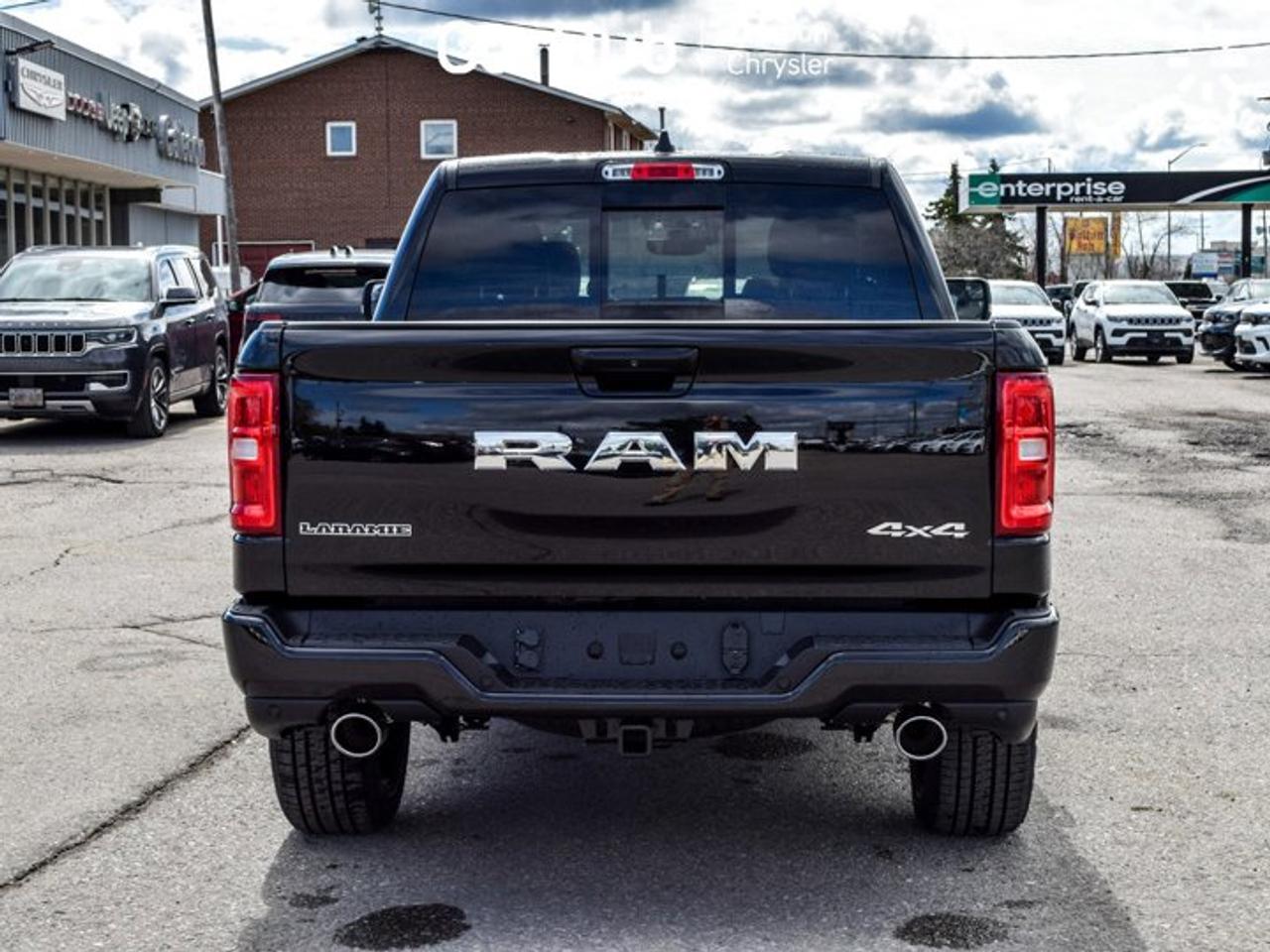 2026 RAM 1500 Laramie 4x4 Crew Cab 5'7" Box Pano Sunroof 14.4"Display 20"Alloy RimsLeather Photo