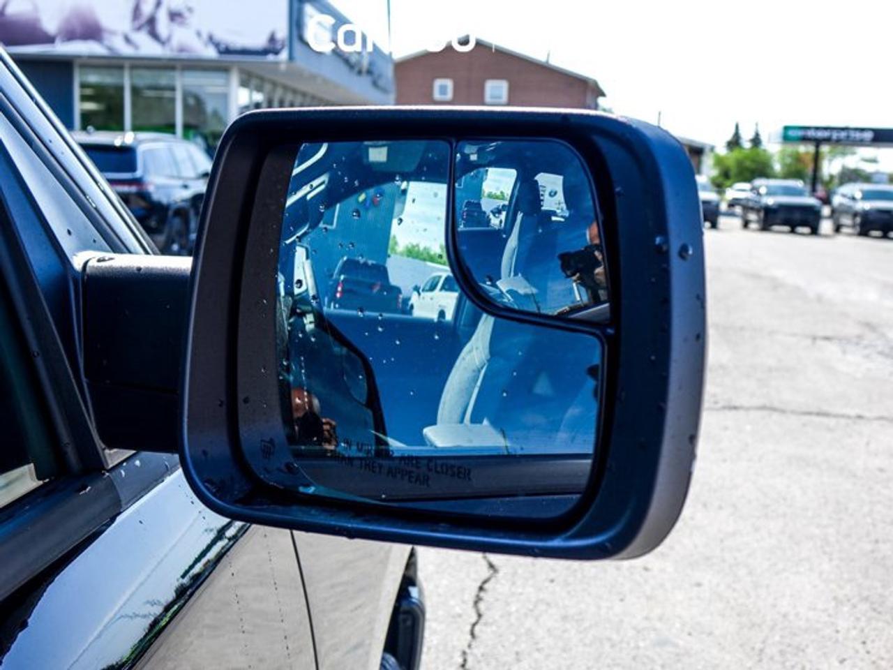 2026 RAM 1500 Express 4x4 Quad Cab 6'4" Box Blind Spot Lane Assist Remote Start 20"Alloy Rims Photo