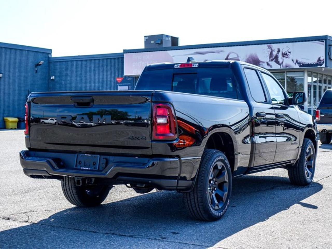 2026 RAM 1500 Express 4x4 Quad Cab 6'4" Box Blind Spot Lane Assist Remote Start 20"Alloy Rims Photo