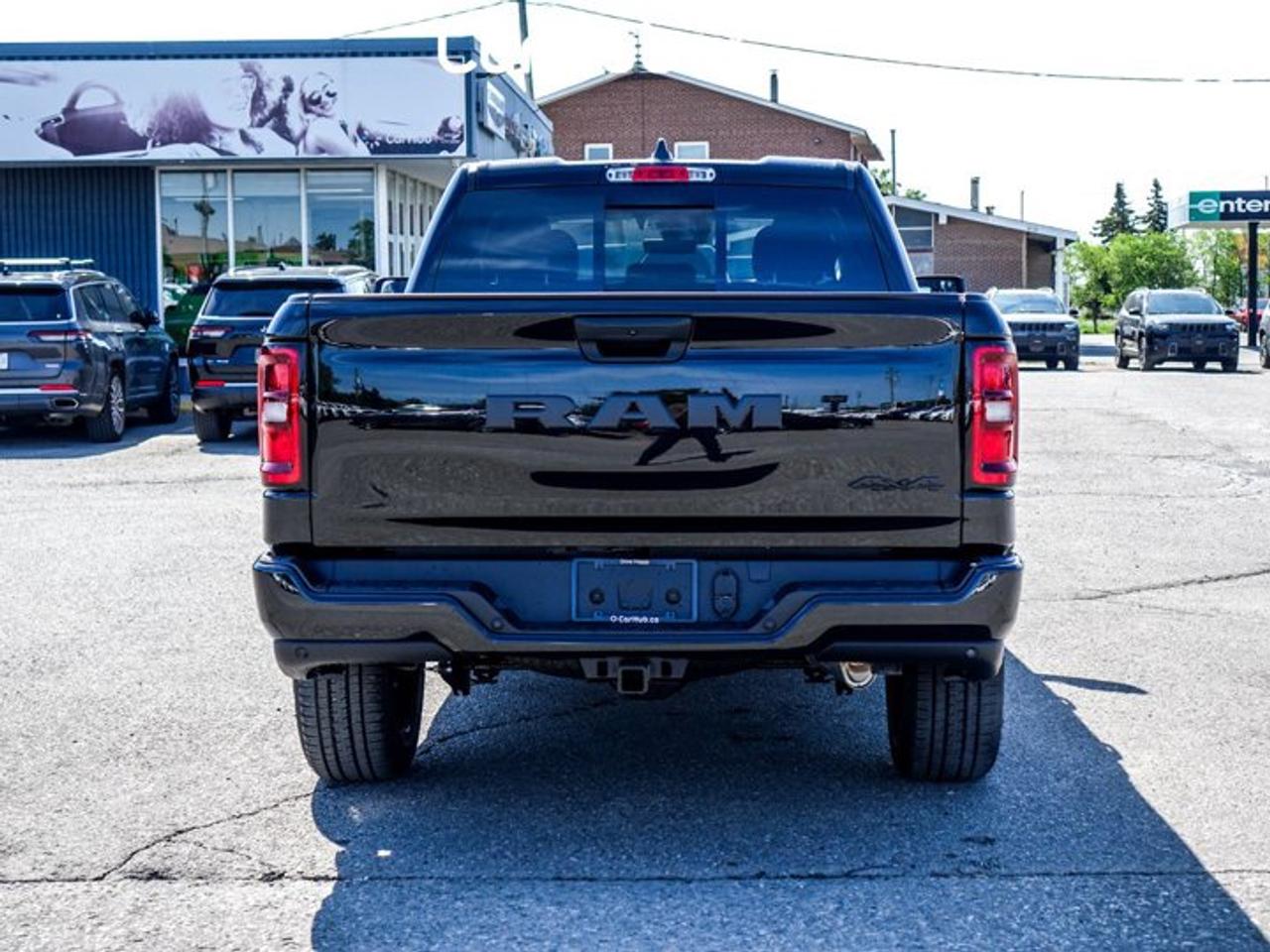 2026 RAM 1500 Express 4x4 Quad Cab 6'4" Box Blind Spot Lane Assist Remote Start 20"Alloy Rims Photo