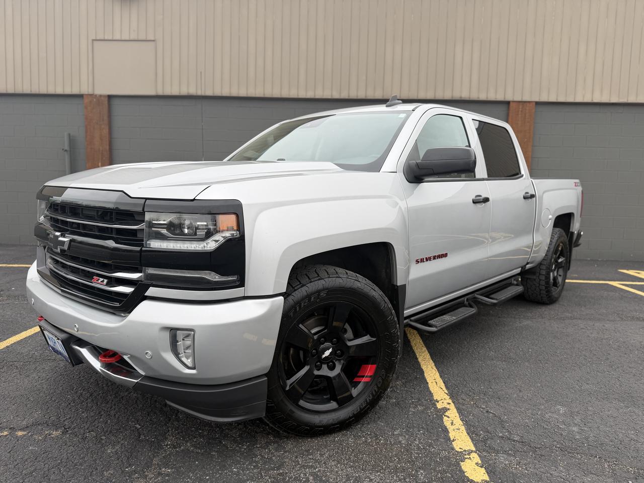 <p dir=ltr style=text-align: center;>Marlin Motors Limited</p><p dir=ltr style=text-align: center;>OMVIC & UCDA Registered</p><p dir=ltr style=text-align: center;>135 Cushman Rd, St Catharines ON</p><p style=text-align: center;><strong>&nbsp;</strong></p><p dir=ltr style=text-align: center;>2018 Chevrolet Silverado LTZ Z71 Redline Edition</p><p style=text-align: center;><strong>&nbsp;</strong></p><p dir=ltr style=text-align: center;>WOW! What a nice truck! Every possible option! Z71 & Redline Edition!</p><p style=text-align: center;><strong>&nbsp;</strong></p><p dir=ltr style=text-align: center;>*CLEAN CARFAX*</p><p style=text-align: center;><strong>&nbsp;</strong></p><p dir=ltr style=text-align: center;>-6.2L V8 Engine</p><p dir=ltr style=text-align: center;>-Leather Seats</p><p dir=ltr style=text-align: center;>-Remote Start</p><p dir=ltr style=text-align: center;>-Front Collision Alert</p><p dir=ltr style=text-align: center;>-Heated Steering Wheel</p><p dir=ltr style=text-align: center;>-Heated & Cooled Seats</p><p dir=ltr style=text-align: center;>-Factory Navigation System</p><p dir=ltr style=text-align: center;>-Front & Rear Park Assist</p><p dir=ltr style=text-align: center;>-Power Adjustable Pedals</p><p dir=ltr style=text-align: center;>-Backup Camera</p><p dir=ltr style=text-align: center;>-Apple Carplay/Android Auto</p><p dir=ltr style=text-align: center;>-BOSE Audio</p><p dir=ltr style=text-align: center;>-Sunroof</p><p dir=ltr style=text-align: center;>-All Weather Mats</p><p dir=ltr style=text-align: center;>-Borla Dual Catback Exhaust</p><p style=text-align: center;><strong><br><br></strong></p><p dir=ltr style=text-align: center;>Just serviced! Including brand new Toyo Open Country tires, front & rear brakes, four-wheel alignment, synthetic oil change & complete detail.</p><p style=text-align: center;><strong>&nbsp;</strong></p><p dir=ltr style=text-align: center;>$24,999 + HST/Licensing</p><p dir=ltr style=text-align: center;>Price Includes Safety & Carfax&nbsp;</p><p style=text-align: center;><strong>&nbsp;</strong></p><p dir=ltr style=text-align: center;>Financing & Warranties Available!&nbsp;</p><p dir=ltr style=text-align: center;>Fill out an application on our website below</p><p dir=ltr style=text-align: center;>Visit our website - <a href=http://marlinmotorsltd.com>marlinmotorsltd.com</a>&nbsp;</p><p style=text-align: center;><strong>&nbsp;</strong></p><p dir=ltr style=text-align: center;>*PLEASE NOTE WE OPERATE BY APPOINTMENT ONLY - CALL OR TEXT 289-407-3002 ANYTIME TO SCHEDULE AN APPOINTMENT*</p><p>&nbsp;</p>