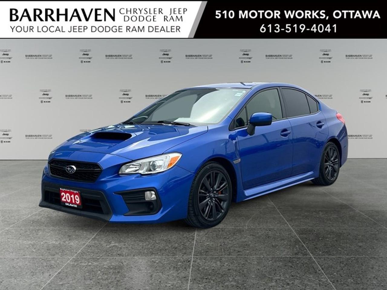 The 2019 Subaru WRX in striking blue with All-Wheel Drive offers an engaging driving experience that excites and handles beautifully through various road conditions. This sedans athletic exterior features bold alloy wheels and a confident stance, hinting at the power beneath its hood. Inside, youll be greeted by a well-appointed cabin that boasts heated front seats, thoughtful leather-wrapped accents on the steering wheel and gear shifter, and a user-friendly interface for your entertainment and navigation needs. Equipped with modern technology, this WRX variant includes a backup camera, Bluetooth connectivity, and smart device integration ensuring both convenience and connectivity on the go. Stay entertained and informed through satellite radio, while safety features like brake assist and keyless entry offer peace of mind every journey. This sharp and sophisticated Subaru WRX with a CVT transmission is perfect for enthusiastic drivers seeking performance and practicality. Contact us today to learn more about this thrilling vehicle and to arrange your test drive. Your new adventure awaits!