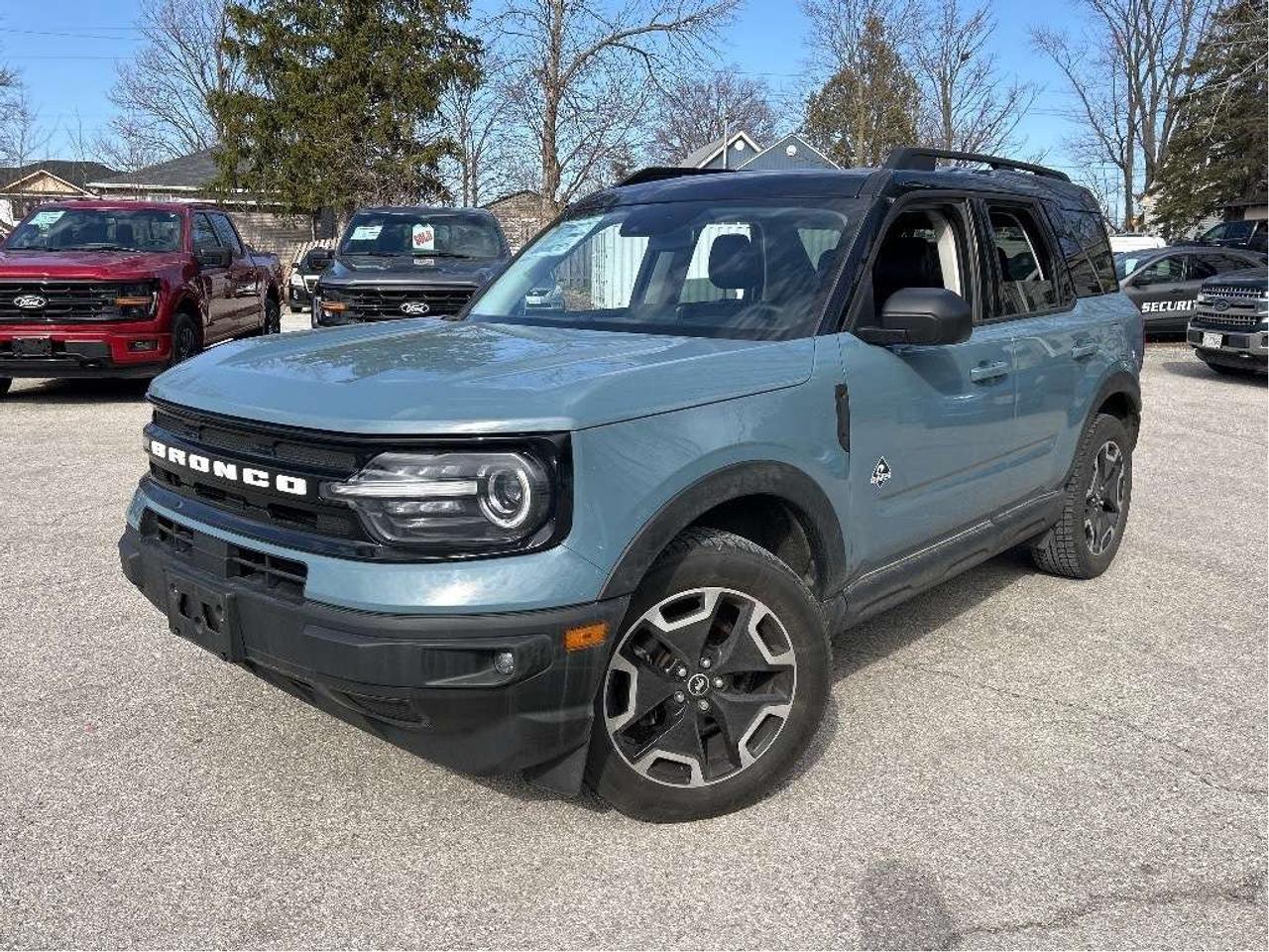 <p>Looking for adventure without sacrificing comfort? Check out this pre-owned 2021 Ford Bronco Sport Outer Banks 4x4, now available at Winegard Ford! This rugged yet refined SUV is ready to tackle both city streets and off-road trails. With its bold design, capable 4-wheel drive, and a host of modern features, the Bronco Sport Outer Banks offers a driving experience thats both exciting and practical. This particular model has 78893KM on the odometer.</p><p>&nbsp;</p><p>This Bronco Sport Outer Banks is packed with features designed to enhance your driving experience. Youll find a comfortable and stylish interior, advanced safety technologies, and convenient amenities. Whether youre planning a weekend getaway or simply need a reliable daily driver, this Bronco Sport is a fantastic choice.</p><p>&nbsp;</p><p>Here are five features that make this Bronco Sport Outer Banks stand out:</p><p><br><br></p><ul><li><strong>Go-Anywhere Capability:</strong> With its 4-wheel drive system, this Bronco Sport is ready to explore, offering confidence on various terrains.</li></ul><p>&nbsp;</p><ul><li><strong>Advanced Safety:</strong> Equipped with Ford Co-Pilot360, including Automatic Emergency Braking and Blind Spot monitoring, this SUV helps keep you and your passengers safe.</li></ul><p>&nbsp;</p><ul><li><strong>Heated Steering Wheel:</strong> Stay comfortable on those chilly Canadian mornings with a heated steering wheel.</li></ul><p>&nbsp;</p><ul><li><strong>FordPass Connect:</strong> Stay connected on the go with a 4G Wi-Fi hotspot.</li></ul><p>&nbsp;</p><ul><li><strong>Stylish Design:</strong> The Outer Banks trim boasts a distinctive look with its black accents and premium interior touches.</li></ul><p><br><br></p><p><strong><em>Powered by AutoIntelligence&trade;</em></strong><br>Vehicle information has been generated using artificial intelligence and is provided for informational purposes only. While efforts are made to ensure accuracy, please confirm all details directly with the dealer.</p><p>&nbsp;</p>