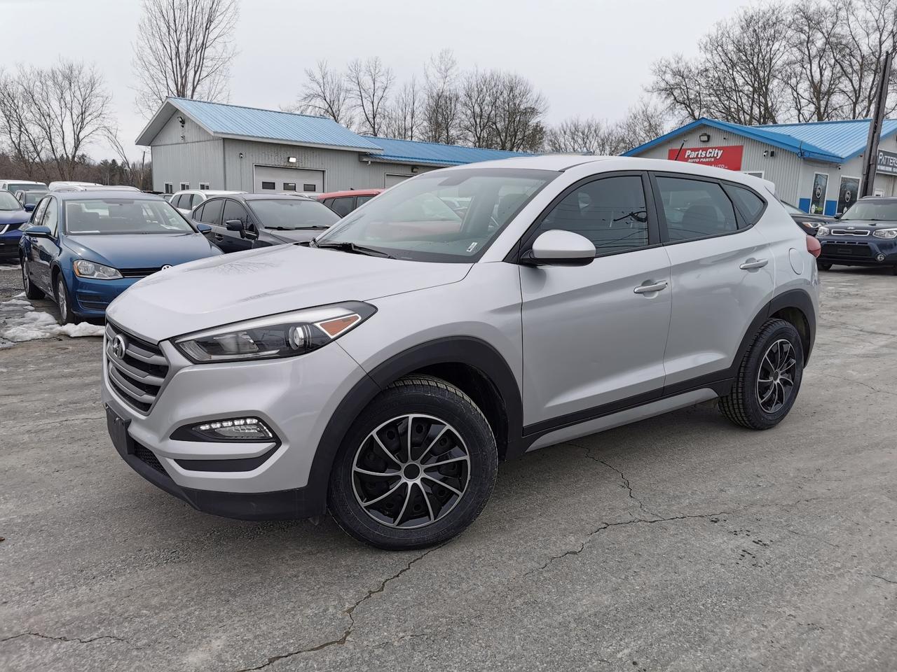 CLEAN CARFAX - LOW KM - WE FINANCE Discover the perfect blend of style, comfort, and reliability with the 2017 Hyundai Tucson SE at Patterson Auto Sales. This pre-owned SUV features a powerful 2.0L L4 DOHC 16V engine, delivering a smooth and efficient drive every time you hit the road. With its spacious interior, advanced safety features, and sleek design, the Tucson SE is ready to elevate your daily commute or weekend adventures. Experience exceptional value and peace of mindvisit us today and take the 2017 Hyundai Tucson SE for a test drive!