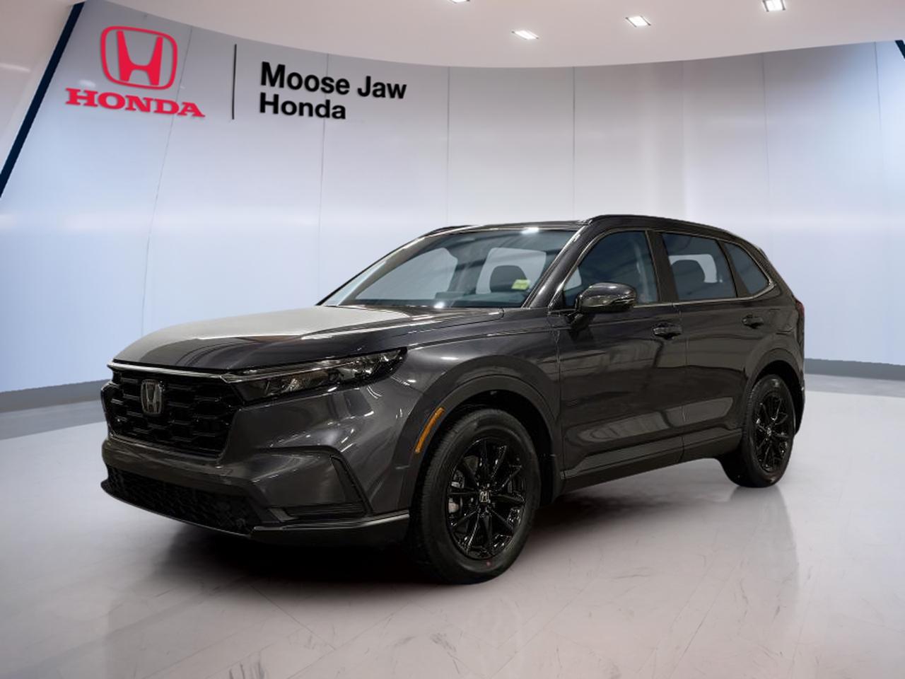 Meet the brand new 2026 Honda CR-V Sport at Moose Jaw Honda in Moose Jaw. This compact SUV blends everyday ease with smart turbo power, all-weather confidence, and a clean Grey exterior with a Black interior. With all-wheel drive and a continuously variable transmission, the 2026 Honda CR-V Sport is ready for city trips and prairie highways.

Built for Canadian drivers, this brand new 2026 Honda CR-V Sport offers a strong mix of comfort, efficiency, and utility. Its 1.5L 16-valve DOHC turbocharged 4-cylinder engine delivers smooth response for daily driving. The roomy cabin and flexible cargo area make this SUV a practical fit for work, family, and weekend plans.

FEATURES OF THE CR-V Sport
»» Grey exterior with sporty CR-V styling
»» Black interior with clean modern layout
»» Real Time AWD for added traction
»» Turbo power with smooth CVT operation

ADVANCED SAFETY FEATURES
»» Advanced airbag system helps protect occupants
»» Stability assist supports confident road control
»» Anti-lock brakes help with steady stops
»» Traction systems aid slippery road driving

PERFORMANCE AND EFFICIENCY
»» 1.5L turbocharged four-cylinder engine included
»» Continuously variable transmission supports smooth acceleration
»» All-wheel drive adds year-round confidence
»» Turbo efficiency suits commuting and travel

COMFORT AND CONVENIENCE
»» Spacious cabin supports daily family comfort
»» Four-door access makes entry very easy
»» Useful layout keeps controls close by
»» Compact SUV size aids urban driving

TECHNONOLGY AND CONNECTIVITY
»» Driver information display keeps data visible
»» Simple control layout supports easy use
»» Modern Honda interface feels intuitive
»» Cabin design keeps essentials within reach

CARGO SPACE
»» Rear cargo area fits daily gear
»» Flexible space supports weekend travel needs
»» Wide opening helps loading larger items
»» Split cabin and cargo balance practicality

WHAT OTHER OWNERS LIKE
»» Smooth ride quality for everyday driving
»» Spacious interior with useful cargo room
»» Confident all-wheel drive in winter
»» Efficient turbo engine with easy manners

The 2026 Honda CR-V Sport is a smart choice for drivers who want versatility without extra fuss. It feels easy to place on the road, yet it offers the interior space many families and commuters need. The turbo engine gives it a lively feel, while the CVT helps keep power delivery smooth and fuel use sensible.

Inside, the 2026 Honda CR-V Sport focuses on function and comfort. The Black interior pairs well with the Grey exterior for a modern look that stays timeless. The cabin is designed to support daily life, with practical storage, clear controls, and the flexibility expected from a compact Honda SUV.

In Moose Jaw, changing weather matters, and the all-wheel-drive system in the 2026 Honda CR-V Sport helps give added control when roads turn rough. From errands around town to highway drives beyond the city, this brand new SUV is built to handle real Canadian conditions with confidence and ease.

This 2026 Honda CR-V Sports VIN is: 2HKRS4H55TH109800.<p>Meet the brand new 2026 Honda CR-V Sport at Moose Jaw Honda in Moose Jaw. This compact SUV blends everyday ease with smart turbo power</p>
<p> and a clean Grey exterior with a Black interior. With all-wheel drive and a continuously variable transmission</p>
<p> and utility. Its 1.5L 16-valve DOHC turbocharged 4-cylinder engine delivers smooth response for daily driving. The roomy cabin and flexible cargo area make this SUV a practical fit for work</p>
<p> and weekend plans.

FEATURES OF THE CR-V Sport
»» Grey exterior with sporty CR-V styling
»» Black interior with clean modern layout
»» Real Time AWD for added traction
»» Turbo power with smooth CVT operation

ADVANCED SAFETY FEATURES
»» Advanced airbag system helps protect occupants
»» Stability assist supports confident road control
»» Anti-lock brakes help with steady stops
»» Traction systems aid slippery road driving

PERFORMANCE AND EFFICIENCY
»» 1.5L turbocharged four-cylinder engine included
»» Continuously variable transmission supports smooth acceleration
»» All-wheel drive adds year-round confidence
»» Turbo efficiency suits commuting and travel

COMFORT AND CONVENIENCE
»» Spacious cabin supports daily family comfort
»» Four-door access makes entry very easy
»» Useful layout keeps controls close by
»» Compact SUV size aids urban driving

TECHNONOLGY AND CONNECTIVITY
»» Driver information display keeps data visible
»» Simple control layout supports easy use
»» Modern Honda interface feels intuitive
»» Cabin design keeps essentials within reach

CARGO SPACE
»» Rear cargo area fits daily gear
»» Flexible space supports weekend travel needs
»» Wide opening helps loading larger items
»» Split cabin and cargo balance practicality

WHAT OTHER OWNERS LIKE
»» Smooth ride quality for everyday driving
»» Spacious interior with useful cargo room
»» Confident all-wheel drive in winter
»» Efficient turbo engine with easy manners

The 2026 Honda CR-V Sport is a smart choice for drivers who want versatility without extra fuss. It feels easy to place on the road</p>
<p> yet it offers the interior space many families and commuters need. The turbo engine gives it a lively feel</p>
<p> the 2026 Honda CR-V Sport focuses on function and comfort. The Black interior pairs well with the Grey exterior for a modern look that stays timeless. The cabin is designed to support daily life</p>
<p> and the all-wheel-drive system in the 2026 Honda CR-V Sport helps give added control when roads turn rough. From errands around town to highway drives beyond the city</p>
<p> this brand new SUV is built to handle real Canadian conditions with confidence and ease.

This 2026 Honda CR-V Sports VIN is: 2HKRS4H55TH109800.</p>