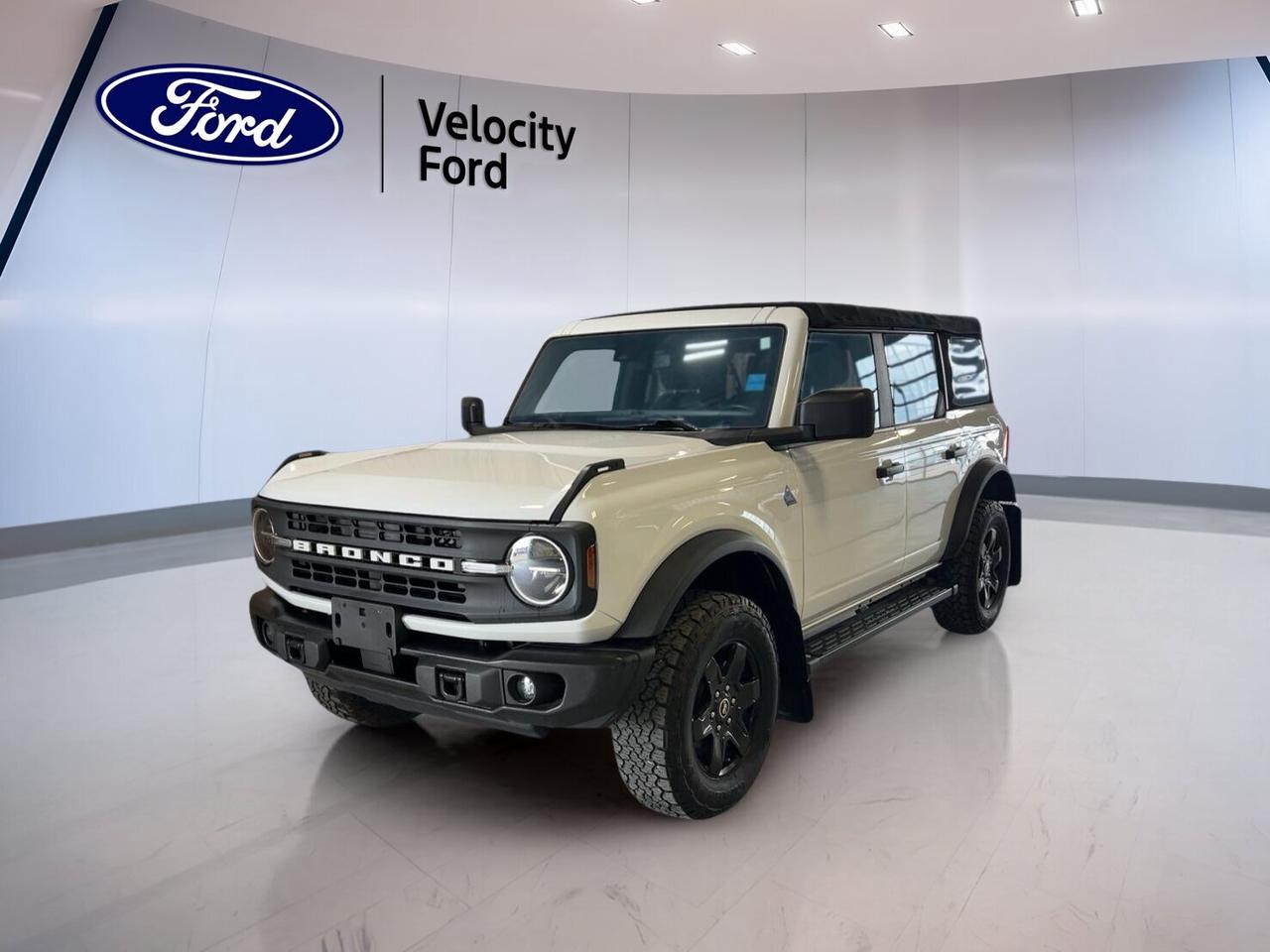 // ACCIDENT FREE!! //
// SINGLE OWNER! //

Meet the 2022 Ford Bronco Black Diamond 4 Door Advanced 4x4, now available at Velocity Ford in Moose Jaw. CARFAX Canada reports no accidents, and this SUV has had a single owner. With 82,001km, a white exterior, black interior, and a strong 2.7-litre unleaded engine, it is ready for work, play, and weekend escapes.

This used 2022 Ford Bronco Black Diamond 4 Door Advanced 4x4 blends rugged utility with open-air freedom. Its 4-door layout adds easy access, while the automatic transmission helps make daily driving simple. With four-wheel drive, off-road tires, steel wheels, and a rear tow hook, this Bronco is built for drivers who want real capability.

FEATURES OF THE Bronco Black Diamond 4 Door Advanced 4x4

»» Standard four-wheel drive for real trail traction
»» Convertible design for open-air driving fun
»» Off-road tires support rough terrain travel
»» Rear tow hook adds practical utility

ADVANCED SAFETY FEATURES

»» Backup camera helps with reversing confidence
»» Anti-lock brakes support controlled stopping
»» Stability control helps maintain vehicle balance
»» Side and head airbags add protection

PERFORMANCE AND EFFICIENCY

»» 2.7-litre unleaded engine delivers strong power
»» Automatic transmission supports smooth daily driving
»» Four-wheel drive boosts grip on loose surfaces
»» Limited slip differential aids off-road traction

COMFORT AND CONVENIENCE

»» Front air conditioning keeps cabin comfortable
»» Cruise control supports relaxed highway travel
»» Power windows add everyday ease
»» Heated mirrors help in cold weather

TECHNOLOGY AND CONNECTIVITY

»» Bluetooth integration supports hands-free phone use
»» WiFi hotspot helps keep devices connected
»» Steering wheel audio controls add convenience
»» Satellite radio expands entertainment choices

CARGO SPACE

»» Four-door layout improves passenger and cargo access
»» Rear trunk access simplifies loading gear
»» Spare tire adds peace of mind
»» Versatile cabin suits daily errands well

AWARDS & RECOGNITIONS

»» North American Utility Vehicle of the Year, North American Car, Truck and Utility Vehicle of the Year, 2022
»» Best 4x4 and Pick-Up, Womens World Car of the Year, 2022

WHAT OTHER OWNERS LIKE

»» Strong off-road ability in varied conditions
»» Easy removable roof for open-air fun
»» Confident four-wheel drive performance year-round
»» Practical mix of utility and comfort

This 2022 Ford Bronco Black Diamond 4 Door Advanced 4x4 stands out with useful equipment that fits real life in Saskatchewan. It includes power steering, power mirrors, tinted windows, automatic headlights, push button start, tire pressure monitoring, child safety locks, driver and passenger airbags, and illuminated vanity mirrors. These features help make each drive more convenient and more secure.

If you want a capable SUV with proven ownership history and true Ford adventure spirit, this 2022 Ford Bronco Black Diamond 4 Door Advanced 4x4 deserves a close look. Visit Velocity Ford in Moose Jaw and see how this Bronco can fit your next drive, your next trip, and your next trail.

This 2022 Ford Bronco Black Diamond 4 Door Advanced 4x4s VIN is: 1FMEE5DP2NLB23814.