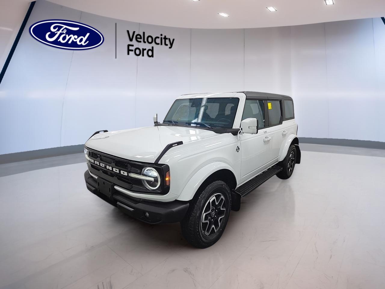 // ACCIDENT FREE!! //
// SINGLE OWNER! //

Meet the 2022 Ford Bronco Base 4 Door Advanced 4x4 at Velocity Ford in Moose Jaw. This used SUV offers true off-road ability, open-air fun, and everyday comfort. CARFAX Canada reports no accidents, and it has had a single owner. With 33,992 km, white exterior paint, black interior, and a 2.7-litre unleaded engine, this Bronco is ready for work, weekends, and adventure.

Built with a rugged body style and four full doors, the 2022 Ford Bronco Base 4 Door Advanced 4x4 blends classic Bronco character with modern function. Its automatic transmission and advanced four-wheel drive system help deliver strong traction on rough roads, gravel, mud, or snow, while its removable roof and convertible design add a fun, open-air driving feel.

FEATURES OF THE Bronco Base 4 Door Advanced 4x4
»» Advanced 4x4 system for real trail use
»» Convertible design for open-air driving freedom
»» Four-door layout adds easy rear access
»» Off-road tires boost grip on loose surfaces

ADVANCED SAFETY FEATURES
»» Backup camera helps while reversing and parking
»» Anti-lock braking system supports controlled stops
»» Stability control adds confidence on slippery roads
»» Side and head airbags enhance protection

PERFORMANCE AND EFFICIENCY
»» 2.7-litre engine delivers strong everyday power
»» Automatic transmission shifts smoothly in traffic
»» Four-wheel drive improves traction off pavement
»» Limited slip differential aids rough terrain grip

COMFORT AND CONVENIENCE
»» Cruise control supports relaxed highway driving
»» Front air conditioning keeps cabin comfortable
»» Power windows add daily driving convenience
»» Heated mirrors help in cold weather

TECHNONOLGY AND CONNECTIVITY
»» Bluetooth integration supports hands-free phone calls
»» WiFi hotspot keeps passengers better connected
»» Satellite radio expands in-cabin entertainment choices
»» Steering wheel audio controls ease adjustments

CARGO SPACE
»» Four-door design improves passenger and cargo access
»» Rear trunk access simplifies loading gear
»» Spare tire adds peace of mind
»» Flexible cabin suits daily gear needs

AWARDS & RECOGNITIONS
»» North American Utility Vehicle winner, North American Car Awards, 2022
»» Best 4x4 and Pickup, AJAC Canadian Car of the Year, 2022

WHAT OTHER OWNERS LIKE
»» Strong off-road capability in all seasons
»» Easy removable roof for open-air fun
»» Powerful engine with smooth automatic shifting
»» Rugged design with practical four-door layout

This Bronco stands out with useful features drivers want most, including cruise control, power steering, ABS, stability control, child safety locks, power mirrors, illuminated vanity mirrors, automatic headlights, LED headlamps, push button start, tire pressure monitoring, and dual shift mode transmission. It is a smart choice for drivers who want classic utility, modern ease, and proven capability in one well-kept Ford SUV.

This 2022 Ford Bronco Base 4 Door Advanced 4x4s VIN is: 1FMEE5DP4NLA84367.