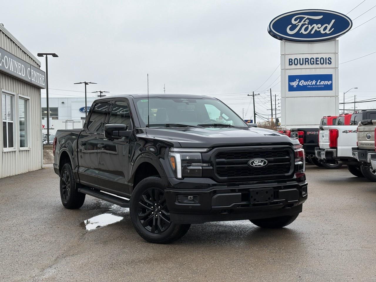 <p>Experience the power and style of the new 2026 Ford F-150 Lariat. Dressed in a sleek black exterior and boasting a robust 4x4 drivetrain, this truck is engineered for superior handling on a variety of terrains.</p><p>The Ford F-150 Lariat exudes confidence with its commanding presence and functional design. Inside, the black interior offers a blend of luxury and durability, perfect for both work and leisure. The spacious SuperCrew cab and 5.5' box ensure that you are ready to tackle any job with ease.</p><p>Advanced technology is at your fingertips with features like the navigation system, smart device integration, and a built-in Wi-Fi hotspot. Safety is a priority with lane assist, a backup camera, and parking sensors that make every drive secure. The adaptive cruise control adds an extra layer of comfort, while the heated and cooled front seats and heated steering wheel cater to your comfort in any weather.</p><p>This vehicle is perfect for those who need a reliable and powerful truck for either work or adventuring, packed with features that enhance performance and convenience. Contact our dealership today to learn more about the new Ford F-150 Lariat and make it yours!</p> <p><span style=color:rgb( 58 , 80 , 95 )>The discount shown on vehicle represents the </span><u>Cash Purchase</u><span style=color:rgb( 58 , 80 , 95 )> discount and is inclusive of all non-stackable and stackable cash purchase discounts from Ford of Canada and Bourgeois Motors Ltd. and is offered in lieu of sub-vented lease or finance rates. To get details on current discounts applicable to this and other vehicles in our inventory for Lease and Finance customer, see a member of our team. All offers for lease or finance are On Approved Credit (OAC).While every effort is made to ensure the accuracy of discounts and programs, programs are subject to change without notice </span><span style=color:rgb( 119 , 119 , 119 )>and may not be accurate or completely current. While every reasonable effort is made to ensure the accuracy of this data, we are not responsible for any errors or omissions contained on these pages.</span></p> <p><strong>Why Choose the Bourgeois Auto Group?</strong></p><p>For 80 years, Bourgeois Auto Group has been delivering exceptional automotive experiences. Our factor trained teams work to ensure you receive the shopping experience you deserve; whether you're looking for a new or new-to-you vehicle.</p><p>Shop 24/7 with our online showroom and chat service, ensuring convenience every step of the way. No hidden fees, full disclosure, and every pre-owned vehicle comes with a Carfax® report for peace of mind.</p><p>We offer a wide selection of pre-owned vehicles, all competitively priced using real-time market data. Get the best deal on your purchase and trade-in with our free Live Market Analysis report.</p><p>Looking to sell your car? We buy any make or modelno purchase required. Our simple to use online trade valuation tool will provide you with a clear, transparent selling experience whether you buy our car or not.</p><p>Backed by hundreds dedicated employees across 4 convenient locations, were here to meet all your automotive needs. Visit us in Midland or Parry Sound and explore our inventory or schedule your next service today.</p> <p><strong>Financing Your Next Vehicle with Bourgeois Motors Ford in Midland:</strong></p><p>At Bourgeois Motors Ford, we make financing your next vehicle simple and stress-free! Our team works with trusted lenders to find flexible options tailored to your budget. Drive away with confidenceapply today!</p><p>Take advantage of our online pre-qualification tool, backed by Equifax and TD Bank to find the payment that works for you. Simply <a href=https://www.bourgeoismotors.com/free-credit-check/ rel=nofollow><strong>CLICK HERE</strong></a><strong> </strong>to use our secure online credit tool with no impact to your credit.</p>