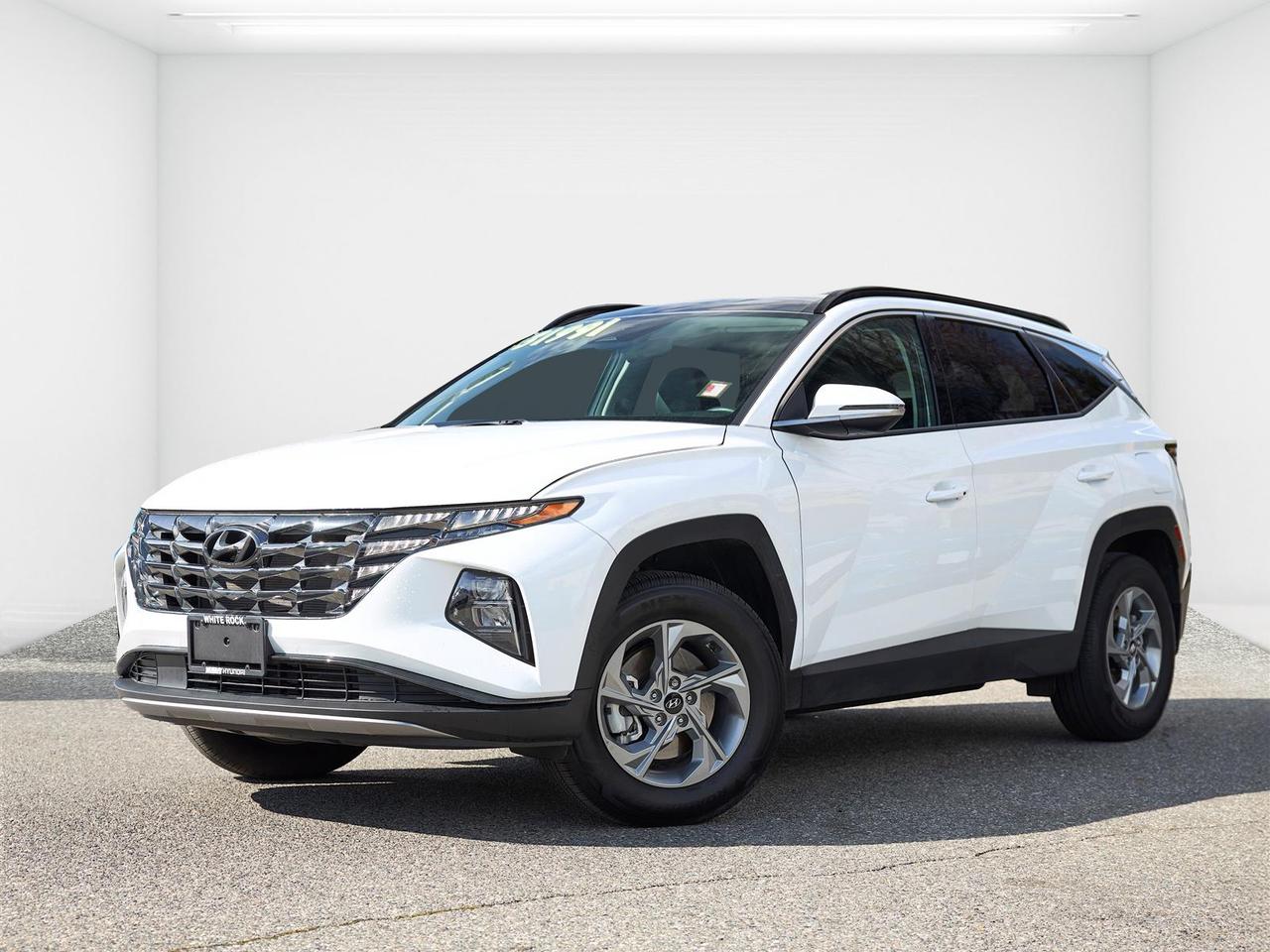 Leather Interior | Panoramic Sunroof | Apple CarPlay & Android Auto | Navigation | Heated Seats | AWD | Blind-Spot Collision Warning<br /><br />2024 Hyundai Tucson Preferred Trend AWD<br /><br />This 2024 Hyundai Tucson Preferred Trend AWD in White is now available at White Rock Hyundai, offering exceptional value in a low kilometre, one-owner compact SUV. With 32,000 km below the market average, this Tucson stands out as a rare find, combining near-new condition with proven reliability. Powered by a 2.5L engine paired with an 8-speed automatic transmission and all-wheel drive, it delivers confident performance for daily driving around White Rock, Surrey, Langley, Delta, and Vancouver. This locally owned vehicle has been purchased and serviced with us, and comes with a clean, no-accident history.<br /><br />The Preferred Trend package adds premium upgrades including a leather interior, panoramic sunroof, and a larger touchscreen with navigation, Apple CarPlay, and Android Auto. Heated front seats, dual-zone climate control, and a heated steering wheel enhance comfort, while advanced safety features like blind-spot collision warning, lane keeping assist, and adaptive cruise control provide added confidence on the road. With its spacious interior and versatile design, this Tucson is a perfect family SUV. If you're searching for a used Hyundai Tucson for sale in White Rock, this low km Trend AWD is a standout choice.<br /><br />Why Buy From White Rock Hyundai?<br />* 7x Hyundai President's Award of Merit Winner<br />* 3x Consumer Choice Award for Business Excellence<br />* AutoTrader Dealer of the Year<br /><br />M-Promise Certified Pre-Owned ($995 value) includes:<br />* 30-day / 2,000 km Exchange Program<br />* 3-day / 300 km Money Back Guarantee<br />* Comprehensive 144-Point Mechanical Inspection<br />* Full Synthetic Oil Change<br />* BC Verified CARFAX<br />* Minimum 6 Month Powertrain Warranty<br /><br />Hyundai Certified Pre-Owned Benefits<br />* 144-Point Inspection<br />* CARFAX Vehicle History Report<br />* Transferable 6-Year / 120,000 km Powertrain Limited Warranty (This is an additional 1 year/20, 000 km beyond the original factory warranty)<br />* 1 Year 24-Hour Roadside Assistance<br />* Preferred Financing Rates Available OAC<br />* 30-Day / 2,000 km Exchange Privilege<br /><br />Buy with confidence at White Rock Hyundai. Our vehicles are priced competitively based on market demand, condition, and kilometres to give our customers a transparent and hassle-free buying experience.<br /><br />Visit White Rock Hyundai today to test drive this 2024 Hyundai Tucson Preferred Trend AWD. We proudly serve drivers in White Rock, South Surrey, Surrey, Delta, Langley, and Vancouver with quality pre-owned vehicles and a professional, no-pressure experience.<br /><br />Contact our team today to confirm availability, explore financing options, and reserve this vehicle.<br /><br />* All vehicle purchases are subject to a $799 administration fee. Dealer #31129.