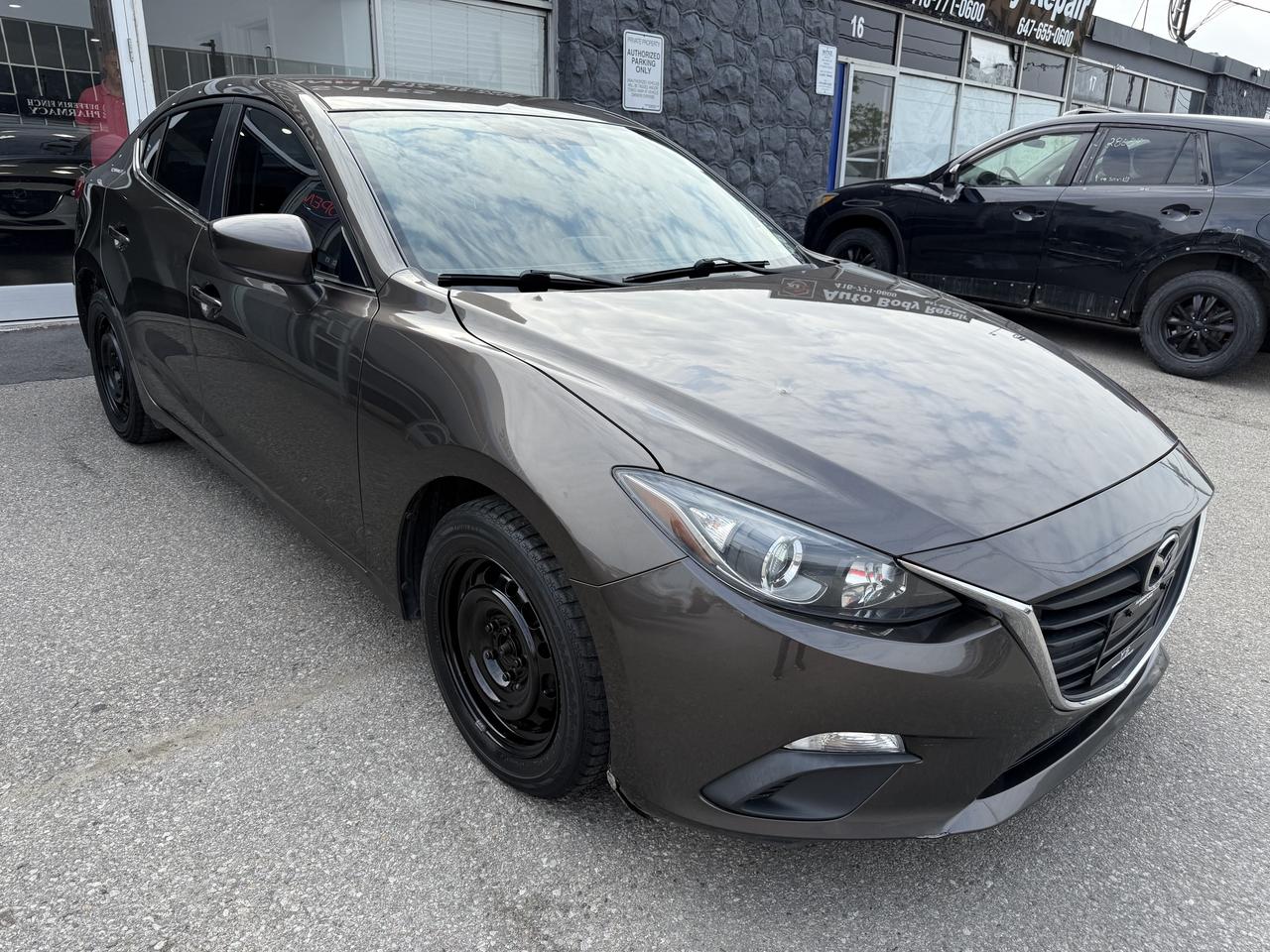 2016 Mazda MAZDA3 i Touring Photo