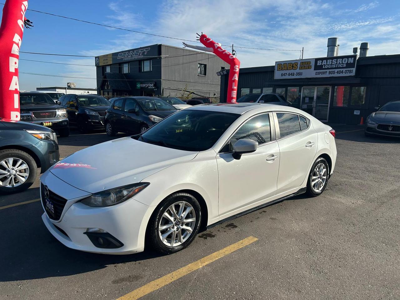 2015 Mazda MAZDA3 i Touring Photo0