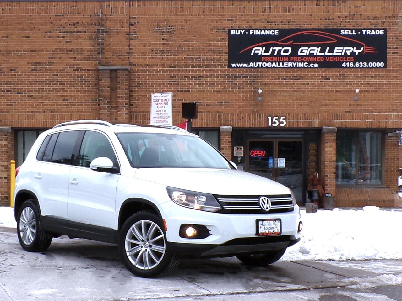 2015 Volkswagen Tiguan TSI HIGHLINE 4MOTION CAMERA PANO ROOF H. SEATS B.T. Photo0