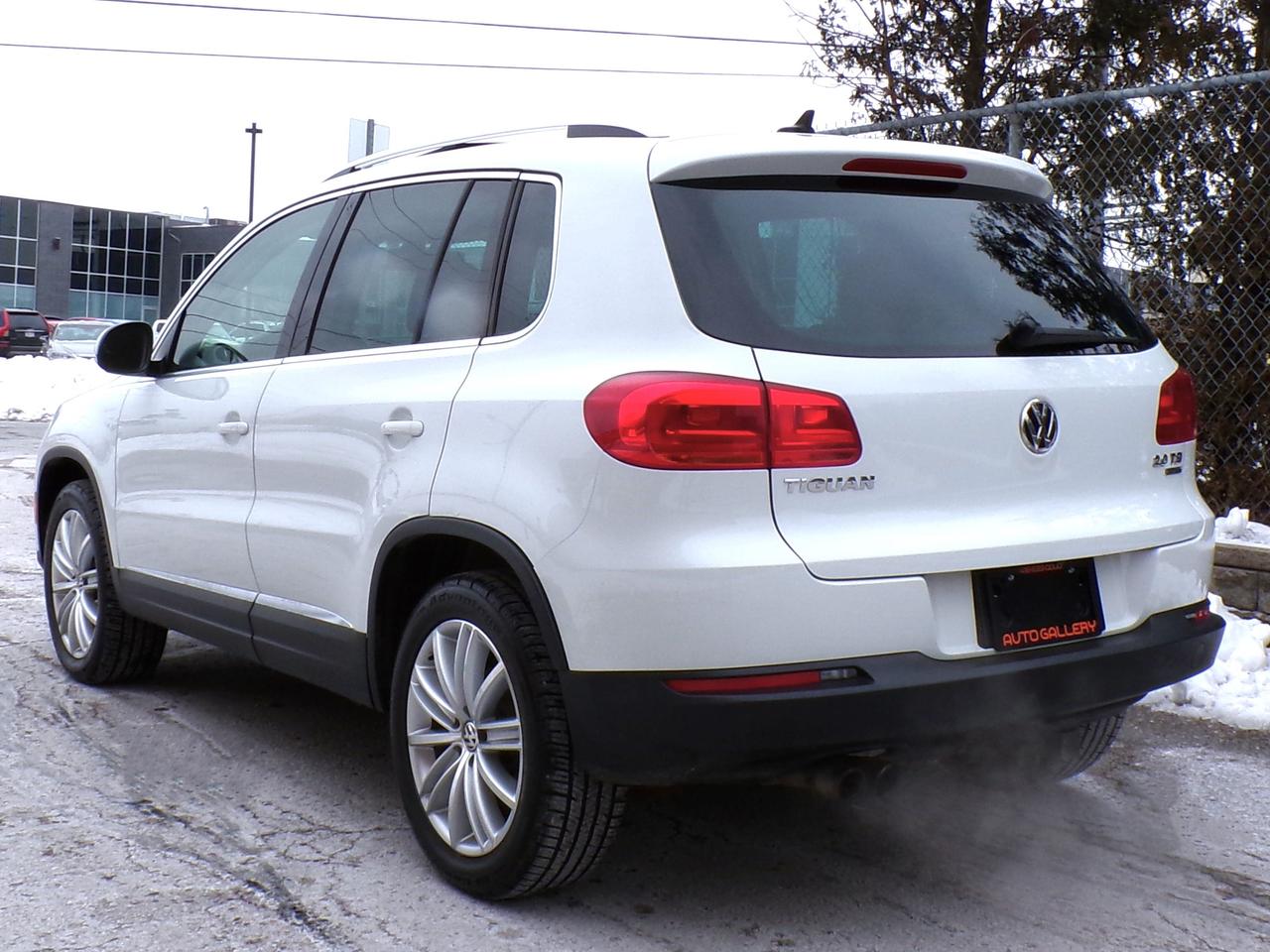2015 Volkswagen Tiguan TSI HIGHLINE 4MOTION CAMERA PANO ROOF H. SEATS B.T. Photo
