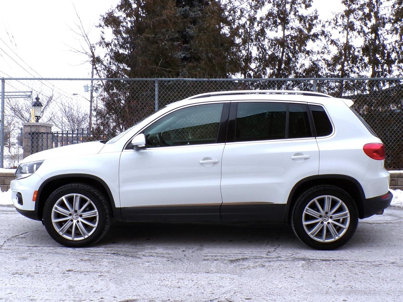 2015 Volkswagen Tiguan TSI HIGHLINE 4MOTION CAMERA PANO ROOF H. SEATS B.T. Photo