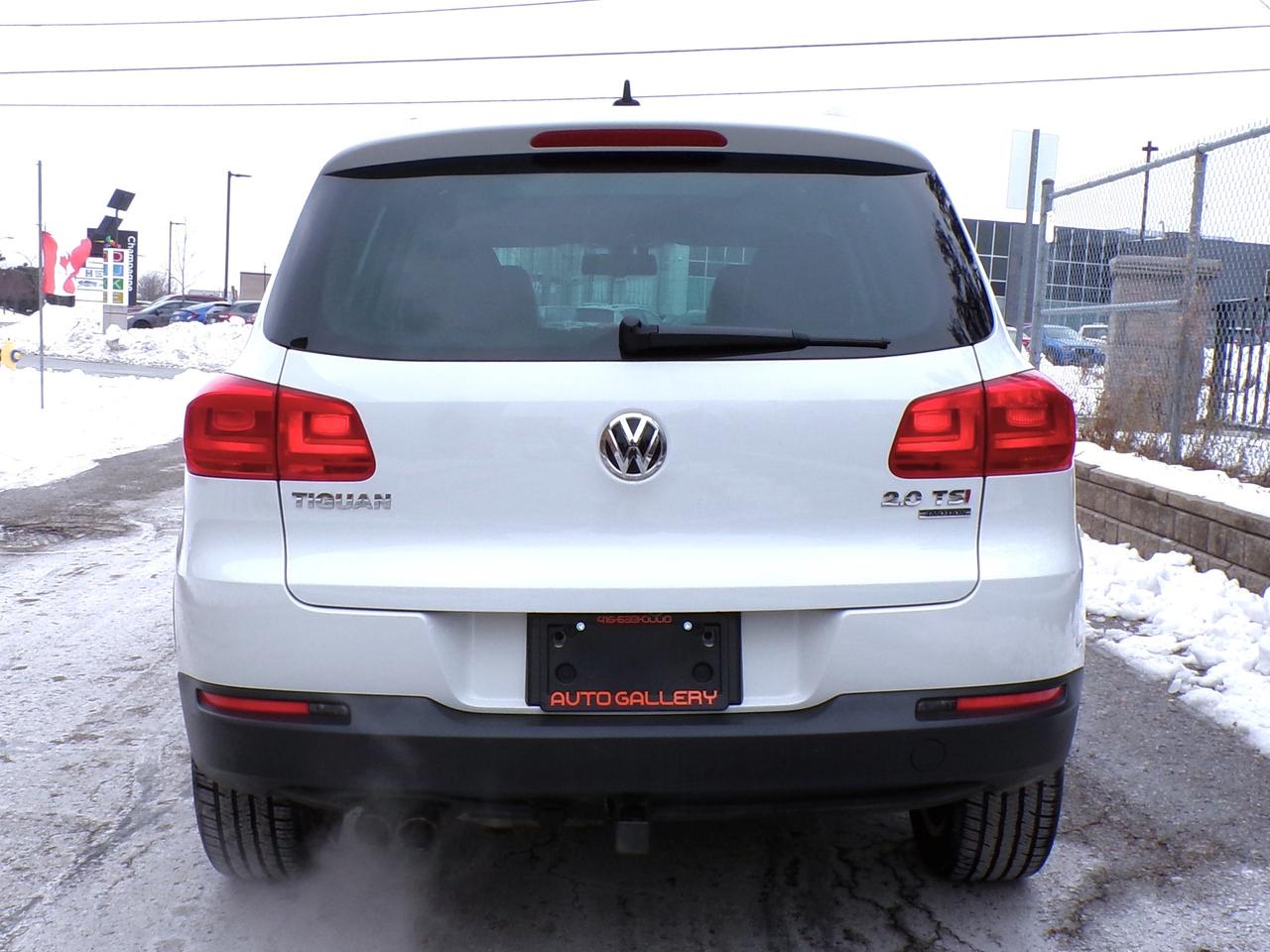 2015 Volkswagen Tiguan TSI HIGHLINE 4MOTION CAMERA PANO ROOF H. SEATS B.T. Photo