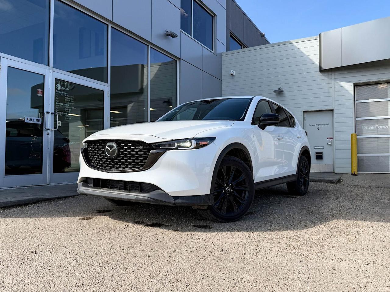 Discover the perfect blend of style, performance, and comfort with this pre-owned 2022 Mazda CX-5 GS AWD in stunning White exterior and sleek Black leather interior. Powered by a refined 2.5L SKYACTIV-G engine paired with smooth 6-speed SKYACTIV-Drive automatic transmission and full-time all-wheel drive, this CX-5 delivers confident handling in all conditions.Enjoy heated front leather seats, a highly responsive 10.2-inch infotainment display with wireless audio streaming, and advanced safety features including blind-spot warning, lane departure prevention, and forward collision mitigation for peace of mind.The 19 black metallic alloy wheels add a sporty touch while premium amenities like power liftgate, power adjustable drivers seat with memory, and a leather-wrapped heated steering wheel ensure everyday luxury.Ready for city streets or weekend escapes, this 2022 CX-5 GS AWD combines Mazdas signature driving dynamics with modern convenience and safety. Schedule a test drive today and experience why the CX-5 is the SUV that fits your lifestyle perfectly!This vehicle has been registered in the province ofQuébecGo Mazda is an AMVIC licensed business