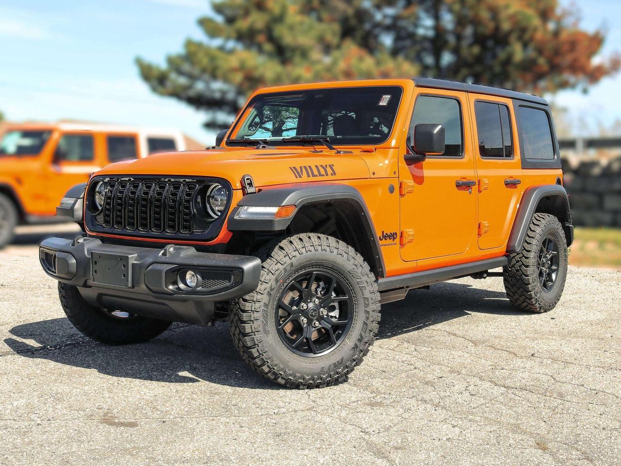 Our New 2026 Jeep Wrangler Willys 4 Door 4X4 featuring the Convenience Package in Joose rides with renowned capability that true adventurers love! Driven by a 3.6 Litre Pentastar V6 supplying 285hp to an 8 Speed Automatic transmission with an Off-Road Plus mode for enhanced trail performance. Dana axles and an electronic locking rear differential help you conquer almost any conditions, and this Four Wheel Drive SUV returns approximately 10.2L/100km on the highway. Eye-catching Willys hood graphics help our Wrangler grab attention with LED lighting, fog lamps, alloy wheels, fender flares, a sport bar, and a fantastic open-air driving experience when you drop the top, fold down the Gorilla Glass windshield, and remove the doors!  The Willys cabin is built for practical comfort with the Convenience Packs heated cloth seats, a heated leather-wrapped steering wheel, remote start, air conditioning, power accessories, pushbutton ignition, auxiliary switches, and 12V power outlets. Uconnect&reg; technology leads the way with a 12.3-inch touchscreen, Apple CarPlay&reg;, Android Auto&reg;, Bluetooth&reg;, an eight-speaker audio system, and an available WiFi hotspot to keep you connected on every drive.  Stay safe as you dominate your days, knowing Jeep has your back with automatic braking, adaptive cruise control, a rearview camera, forward collision warning, trailer sway damping, hill start assistance, and more. The world awaits, and our Wrangler Willys is ready to go! Save this Page and Call for Availability. We Know You Will Enjoy Your Test Drive Towards Ownership!