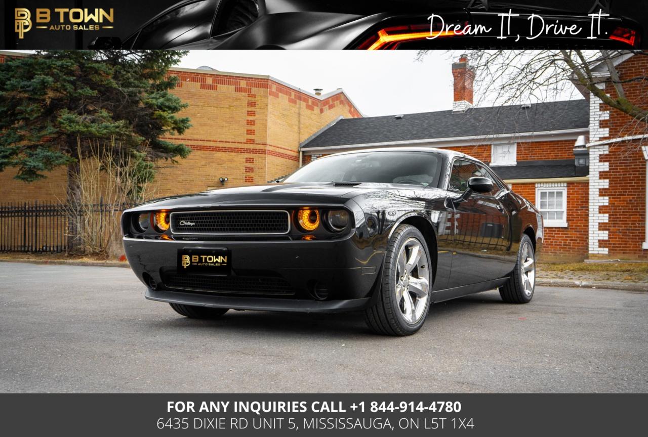 <span><strong>2014 Dodge Challenger SXT delivers classic muscle car styling with smooth V6 performance and everyday comfort.</strong> Finished in Black over Black interior, it offers bold presence with practical drivability.</span>







<span>Powered by a <strong>3.6L Pentastar V6 paired with an automatic transmission and rear-wheel drive</strong>, it delivers reliable performance, smooth acceleration, and a comfortable ride.</span>




<strong>Key Features & Options:</strong>

<span>Sport Mode</span>

<span>Dual Exhaust</span>

<span>Cloth Interior</span>

<span>Power Driver Seat</span>

<span>Touchscreen Infotainment System</span>

<span>Bluetooth Connectivity</span>

<span>Cruise Control</span>

<span>Keyless Entry</span>

<span>Push-Button Start</span>







<strong>At B-Town Auto Sales, each vehicle undergoes a comprehensive inspection to ensure exceptional quality and performance. We proudly serve customers across the Greater Toronto Area and beyond, offering competitive financing, trade-ins, and nationwide shipping.</strong>




<strong>Special Financing price: $ *</strong>

<strong>Cash Price: $ *</strong>




<strong>Thank you for choosing B-Town Auto Sales.</strong>