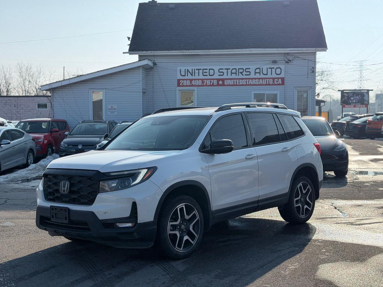 2023 Honda Passport Touring Photo0