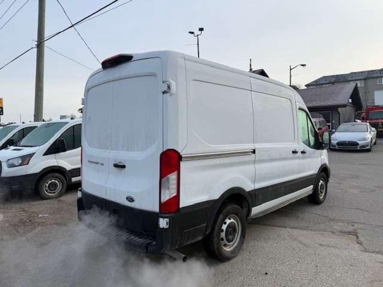 2023 Ford Transit Cargo Van T-150 130  Med Rf 8670 GVWR RWD Photo