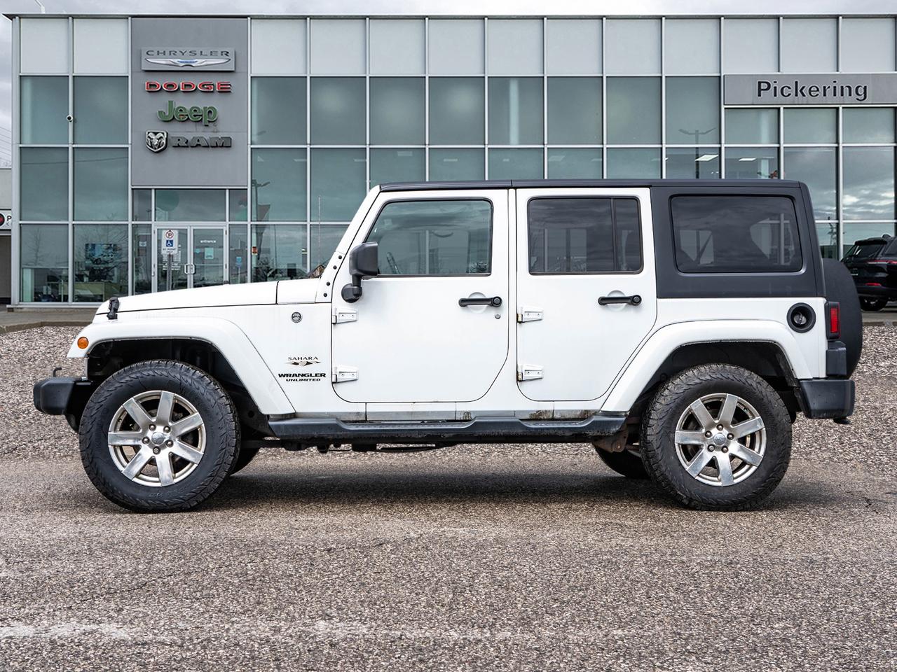 2016 Jeep Wrangler 4WD 4DR SAHARA Photo