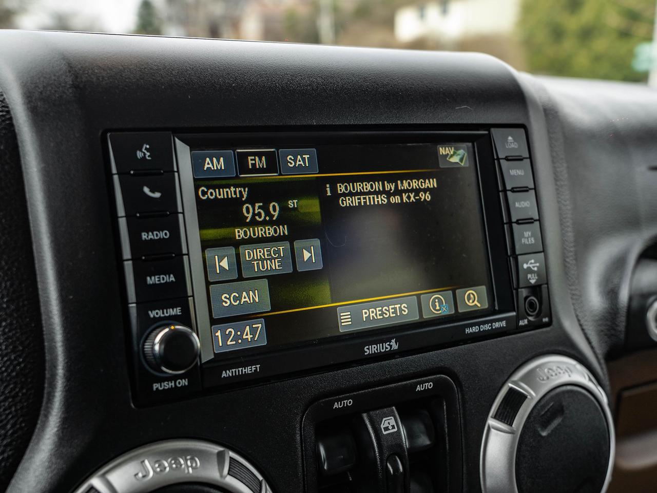 2016 Jeep Wrangler 4WD 4DR SAHARA Photo