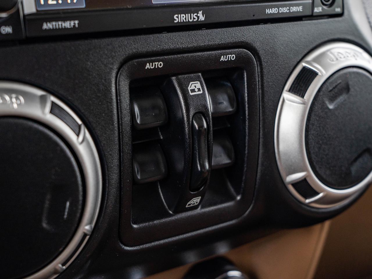2016 Jeep Wrangler 4WD 4DR SAHARA Photo