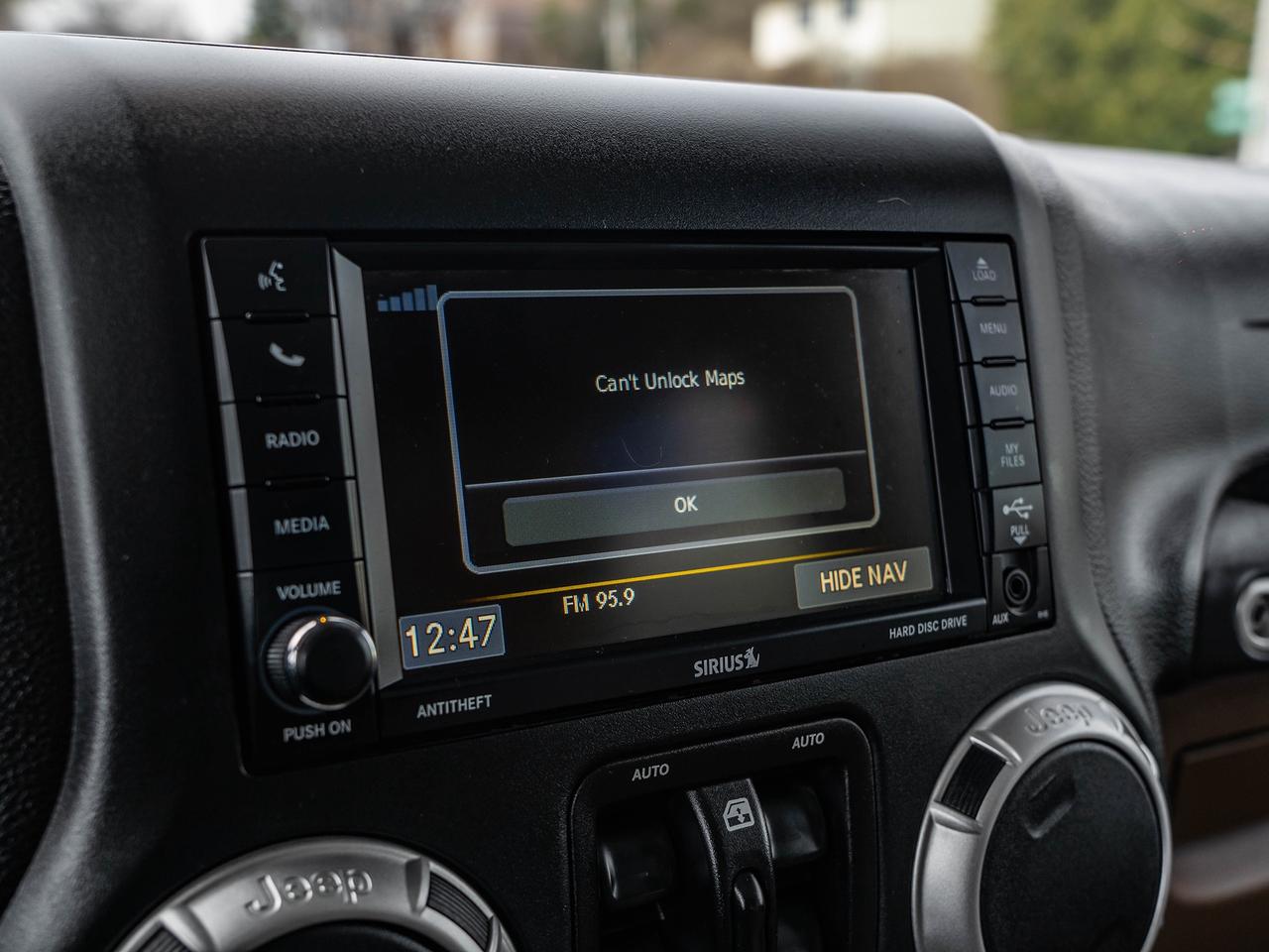 2016 Jeep Wrangler 4WD 4DR SAHARA Photo