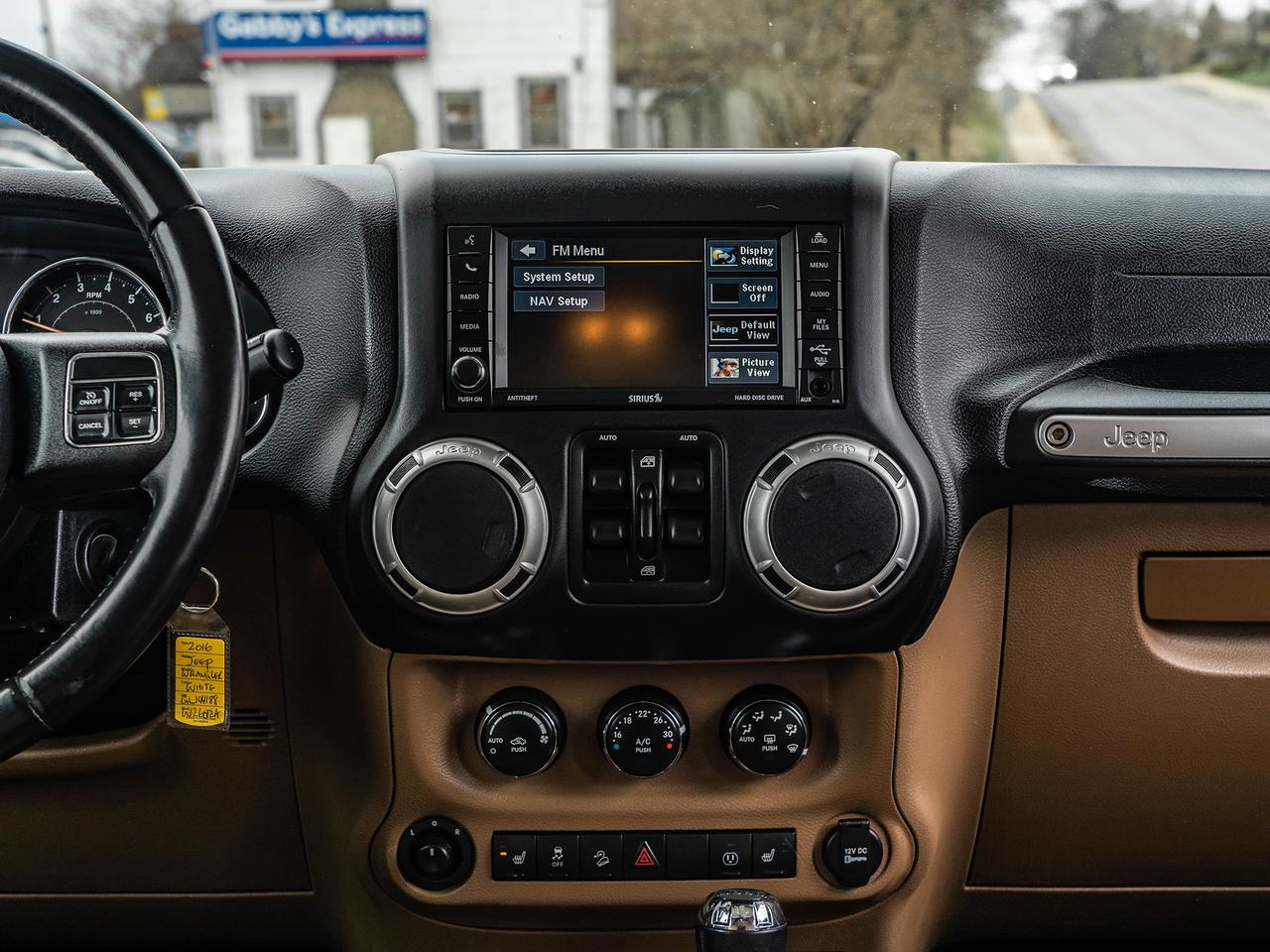 2016 Jeep Wrangler 4WD 4DR SAHARA Photo