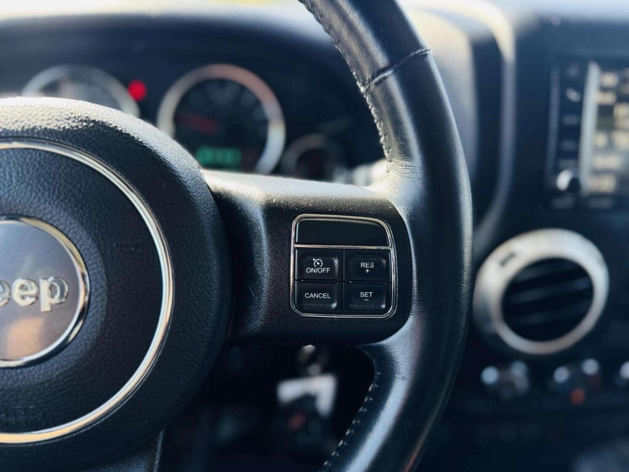 2016 Jeep WRANGLER UNLIMITED Sahara 4dr 4x4 AUTOMATIC Photo