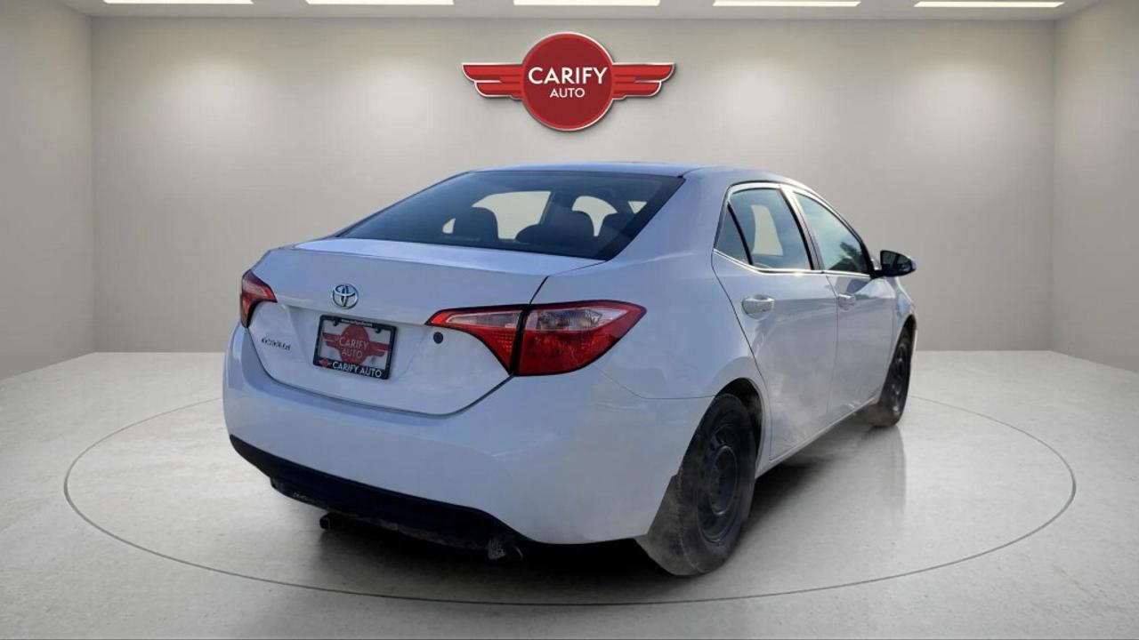 2017 Toyota Corolla 4dr Sedan CVT CE Photo