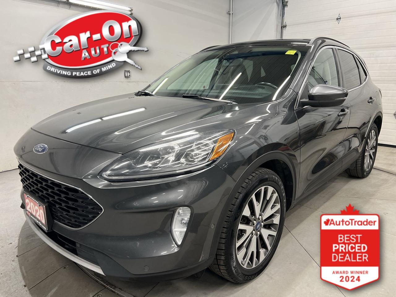 TOP OF THE LINE HYBRID TITANIUM ALL-WHEEL DRIVE!!! Leather, panoramic sunroof, heated seats & steering, heads-up display, Android Auto/ Apple CarPlay, remote start, navigation, adaptive cruise control, blind spot monitor, rear cross-traffic alert, pre-collision system, lane departure warning, backup camera w/ front & rear park sensors, premium Bang & Olufsen audio system, dual-zone climate control, keyless entry w/ push start, power liftgate, full power group inc. power driver & passenger seats, automatic headlights, Bluetooth and Sirius XM!!