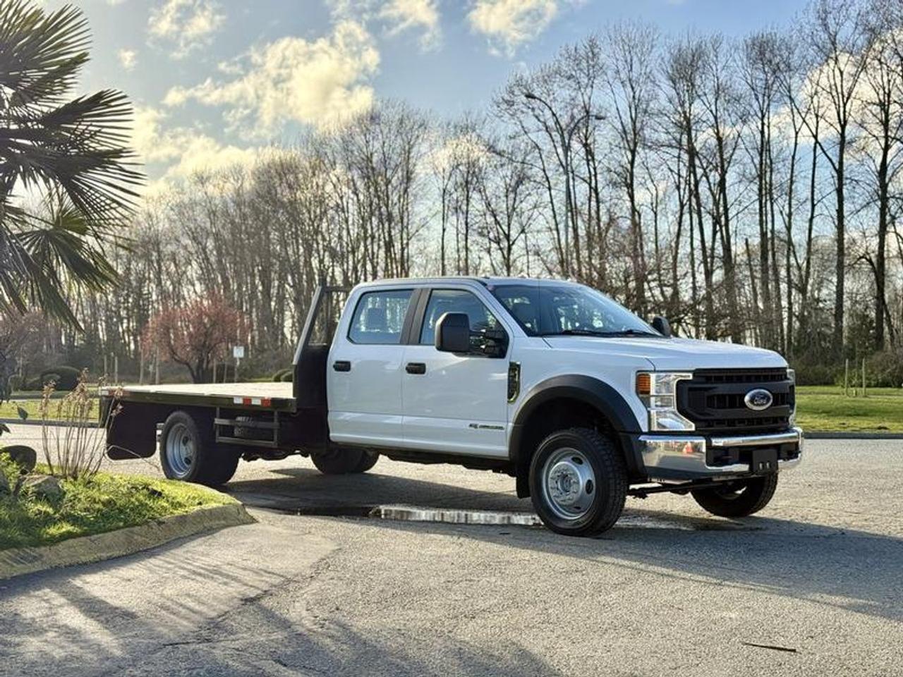 This 2020 Ford F-550 XL crew cab flatdeck is powered by a 6.7L Powerstroke V8 diesel paired with an automatic transmission and 4x4 capability, offering a strong and versatile setup for hauling and work applications. It features a 12-foot by 8-foot flatdeck, along with a trailer brake controller and exhaust brake for improved towing control. Additional equipment includes cruise control, air conditioning, and AM/FM radio, with a durable cloth interior. Finished in white with a grey interior, this four-door heavy-duty truck is well-suited for commercial, construction, or equipment transport use. This item is currently OFFSITE. You must register an appointment with our office to schedule an offsite viewing. Appointments must be made a minimum of one business day in advance (and as defined by the days that Repo.com is open for business) before your appointment can be scheduled and confirmed. We may, at our own discretion, instead opt to transport smaller items to Repo.coms main yard for viewing purposes.  $77,730.00 plus $375 processing fee, $78,105.00 total payment obligation before taxes.  Listing report, warranty, contract commitment cancellation fee, financing available on approved credit (some limitations and exceptions may apply). All above specifications and information is considered to be accurate but is not guaranteed and no opinion or advice is given as to whether this item should be purchased. We do not allow test drives due to theft, fraud, acts of vandalism and undetectable impaired driving. Instead we provide the following benefits: Complimentary Warranty (with options to extend), Limited Money Back Satisfaction Guarantee on Fully Completed Contracts, Contract Commitment Cancellation, and an Open-Ended Sell-Back Option. Ask seller for details or call 604-522-REPO(7376) to confirm listing availability.