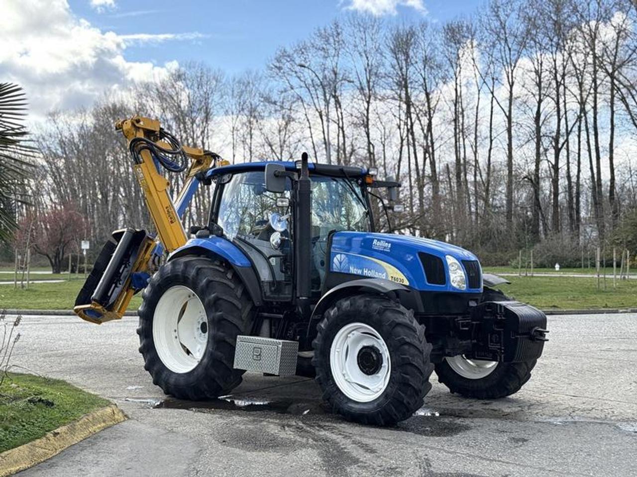 Used 2010 NEW HOLLAND T6030 4x4 Diesel Tractor with Ditch Mower for sale in Burnaby, BC