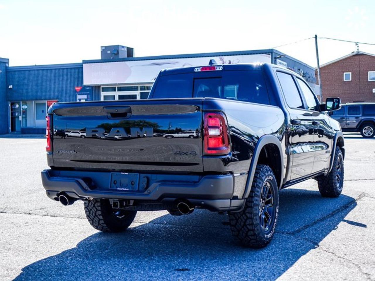 2026 RAM 1500 Rebel 4x4 Crew Cab 5'7" Box 12"Display Navi Remote Start Heated Front Seats Photo