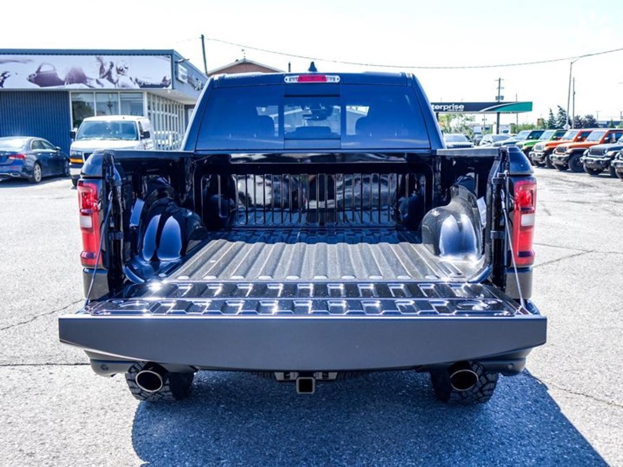 2026 RAM 1500 Rebel 4x4 Crew Cab 5'7" Box 12"Display Navi Remote Start Heated Front Seats Photo