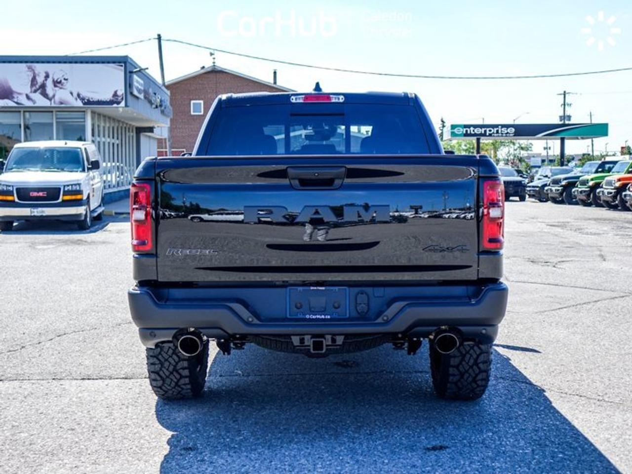 2026 RAM 1500 Rebel 4x4 Crew Cab 5'7" Box 12"Display Navi Remote Start Heated Front Seats Photo