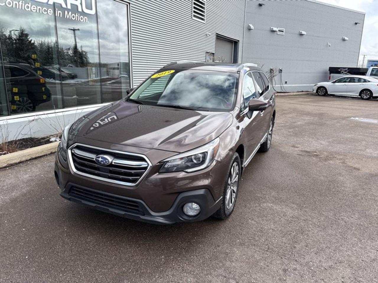 Looking for a versatile SUV that blends comfort, capability, and proven reliability? This 2019 Subaru Outback 3.6R delivers it all, with the added benefit of a powerful six-cylinder engine and Subarus legendary all-weather confidence.Under the hood, the 3.6L SUBARU BOXER 6-cylinder engine offers smooth, effortless power paired with a Lineartronic CVT, making highway passing and long-distance driving a breeze. Combined with Subarus Symmetrical All-Wheel Drive, this Outback is perfectly suited for Canadian winters, rough roads, and weekend adventures alike.Inside, you,ll find a spacious and refined interior designed with both comfort and practicality in mind. Premium materials, a power-adjustable drivers seat, heated front and rear seats, and dual-zone climate control ensure everyone rides in comfort. The Outbacks wide-opening rear hatch and generous cargo space make it ideal for road trips, outdoor gear, or everyday errands.Stay connected with an intuitive infotainment system featuring Apple CarPlay, Android Auto, Bluetooth, and a large touchscreen display. Everything you need is right at your fingertips.Safety is a standout with Subaru EyeSight Driver Assist Technology, including adaptive cruise control, pre-collision braking, lane departure warning, and helping keep you and your passengers protected on every journey.With its raised ground clearance, rugged design, and car-like handling, the 2019 Outback 3.6R offers the perfect balance of SUV capability and everyday drivability.If youre searching for a dependable, well-equipped vehicle thats ready for anything from daily commuting to weekend getaways, this Subaru Outback 3.6R is an excellent choice.Contact us today to schedule your test drive.
