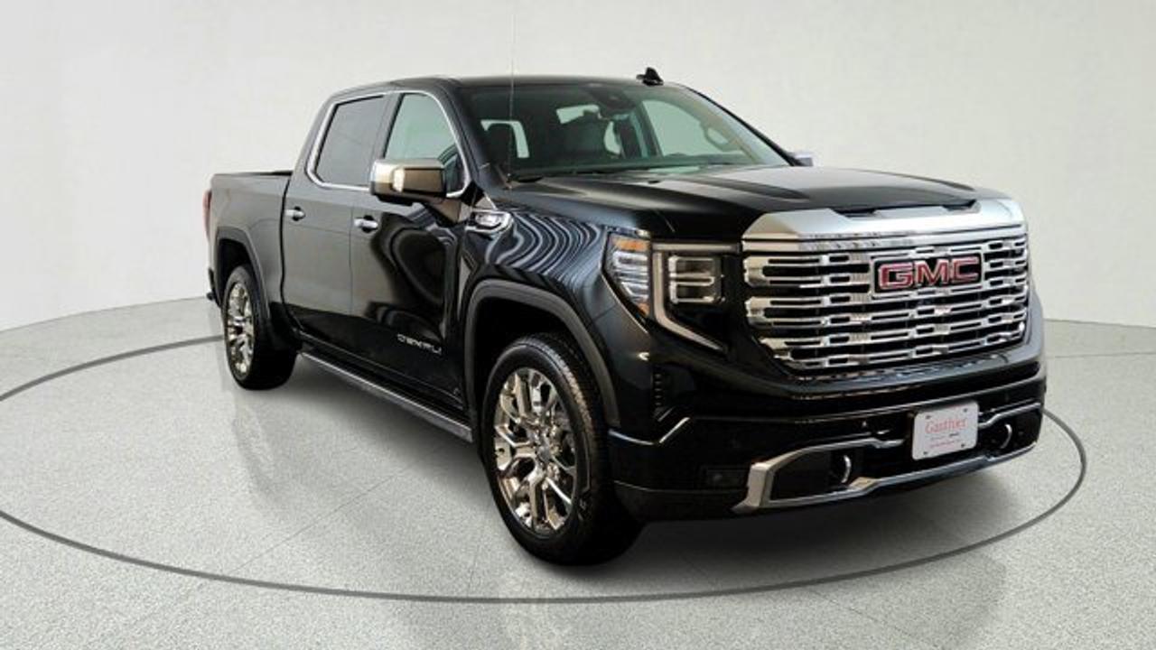 The 2026 GMC Sierra 1500 Denali with the 3.o litre Duramax Diesel, paired with a 10-speed automatic transmission provides both fuel efficiency and torque. Its Denali Reserve Package includes a sunroof, MultiPro power steps, a technology package including a rear-camera mirror and 15-inch multicolor head-up display. Visually and in ride presence, the 22-inch painted aluminum wheels with machining and bright chrome inserts set this trim apart, and the Jet Black Forge perforated leather interior with heated/ventilated front seats, as well as many comfort and driver assistance features rounds out the premium experience.