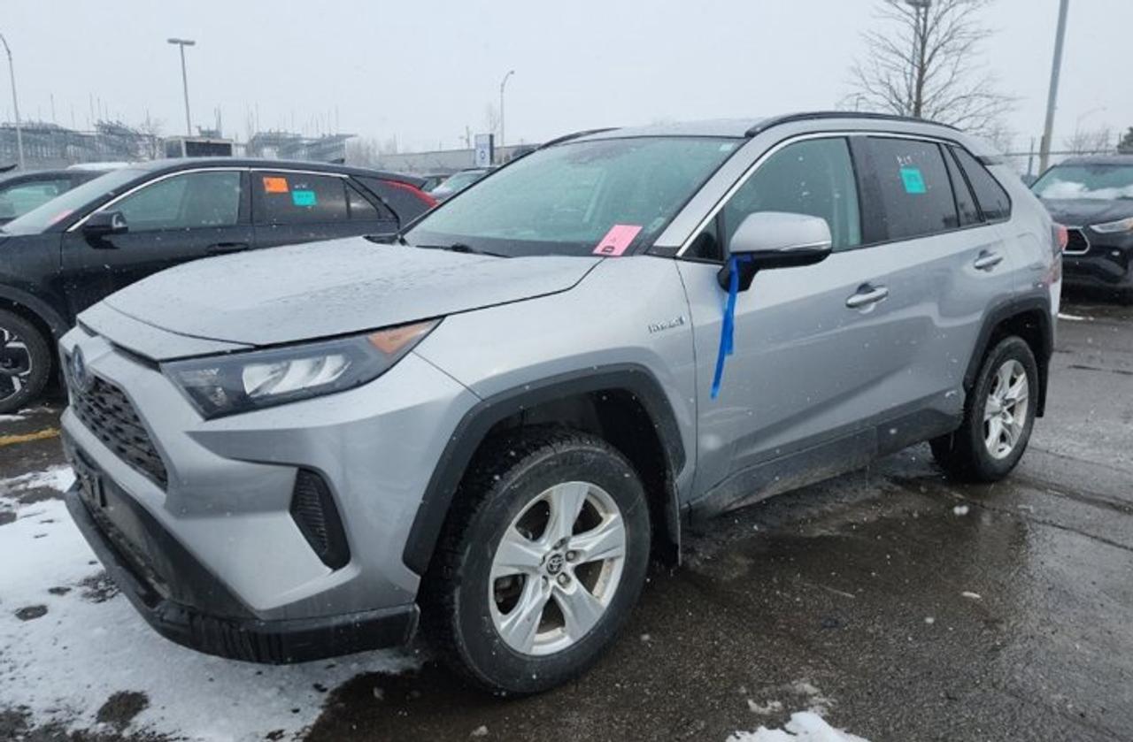 Look at this certified 2021 Toyota RAV4 Hybrid LE AWD | Radar Cruise | Heated Seats | CarPlay + Android | Rear Camera | and More !. Its Automatic transmission and 2.5 L engine will keep you going. This Toyota RAV4 features the following options: Reverse Camera, Radar Cruise, Air Conditioning, Heated Seats, Tilt Steering Wheel, Steering Radio Controls, Power Windows, Power Locks, Traction Control, and Power Mirrors. Test drive this vehicle at Mark Wilsons Better Used Cars, 5055 Whitelaw Road, Guelph, ON N1H 6J4.MASSIVE SELECTION: 500+ vehicles in ONE LOCATION, all Live Market Priced for the best value!STRAIGHTFORWARD & TRANSPARENT PRICING: Our Advertised Price INCLUDES:Safety Certification! (No separate certification fee upcharge).FREE Carfax History Report!NO upcharge for paying cash!CONFIDENCE & PEACE OF MIND: 30-Day/3,000 km Warranty INCLUDED! Plus a 5-Day Exchange Privilege!*EASY FINANCING: Better-than-bank rates, $0 Down, and 3 Months No Payments available OAC. BAD CREDIT APPROVED HERE!WE BUY CARS: Get Top Dollar for your trade, or sell us your vehicle for CASH even if you dont buy ours!www.shopwilsons.comAn Honest, Transparent Buying Experience. Trusted in business since 1961!(Cash Prices Exclude HST and Licensing Fees only.)