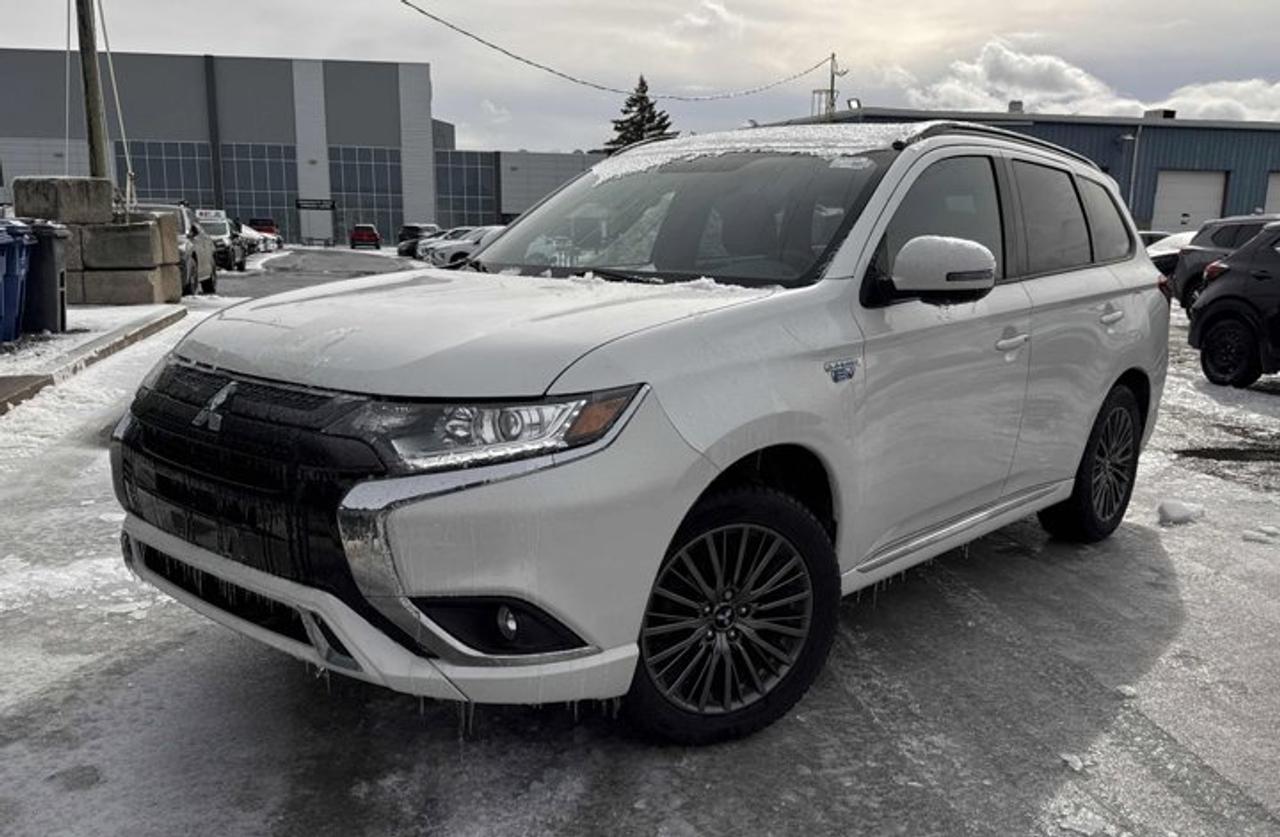 Look at this certified 2022 Mitsubishi Outlander PHEV Black Edition | Pano Roof | Quilted Leather | Heated Seats + Steering | Power Liftgate | and More !. Its Automatic transmission and 2.4 L engine will keep you going. This Mitsubishi Outlander PHEV has the following options: Reverse Camera, Panoramic Roof, Leather, Heated Steering Wheel, Apple Car Play, Air Conditioning, 4WD, Heated Seats, Tilt Steering Wheel, and Steering Radio Controls. See it for yourself at Mark Wilsons Better Used Cars, 5055 Whitelaw Road, Guelph, ON N1H 6J4.MASSIVE SELECTION: 500+ vehicles in ONE LOCATION, all Live Market Priced for the best value!STRAIGHTFORWARD & TRANSPARENT PRICING: Our Advertised Price INCLUDES:Safety Certification! (No separate certification fee upcharge).FREE Carfax History Report!NO upcharge for paying cash!CONFIDENCE & PEACE OF MIND: 30-Day/3,000 km Warranty INCLUDED! Plus a 5-Day Exchange Privilege!*EASY FINANCING: Better-than-bank rates, $0 Down, and 3 Months No Payments available OAC. BAD CREDIT APPROVED HERE!WE BUY CARS: Get Top Dollar for your trade, or sell us your vehicle for CASH even if you dont buy ours!www.shopwilsons.comAn Honest, Transparent Buying Experience. Trusted in business since 1961!(Cash Prices Exclude HST and Licensing Fees only.)