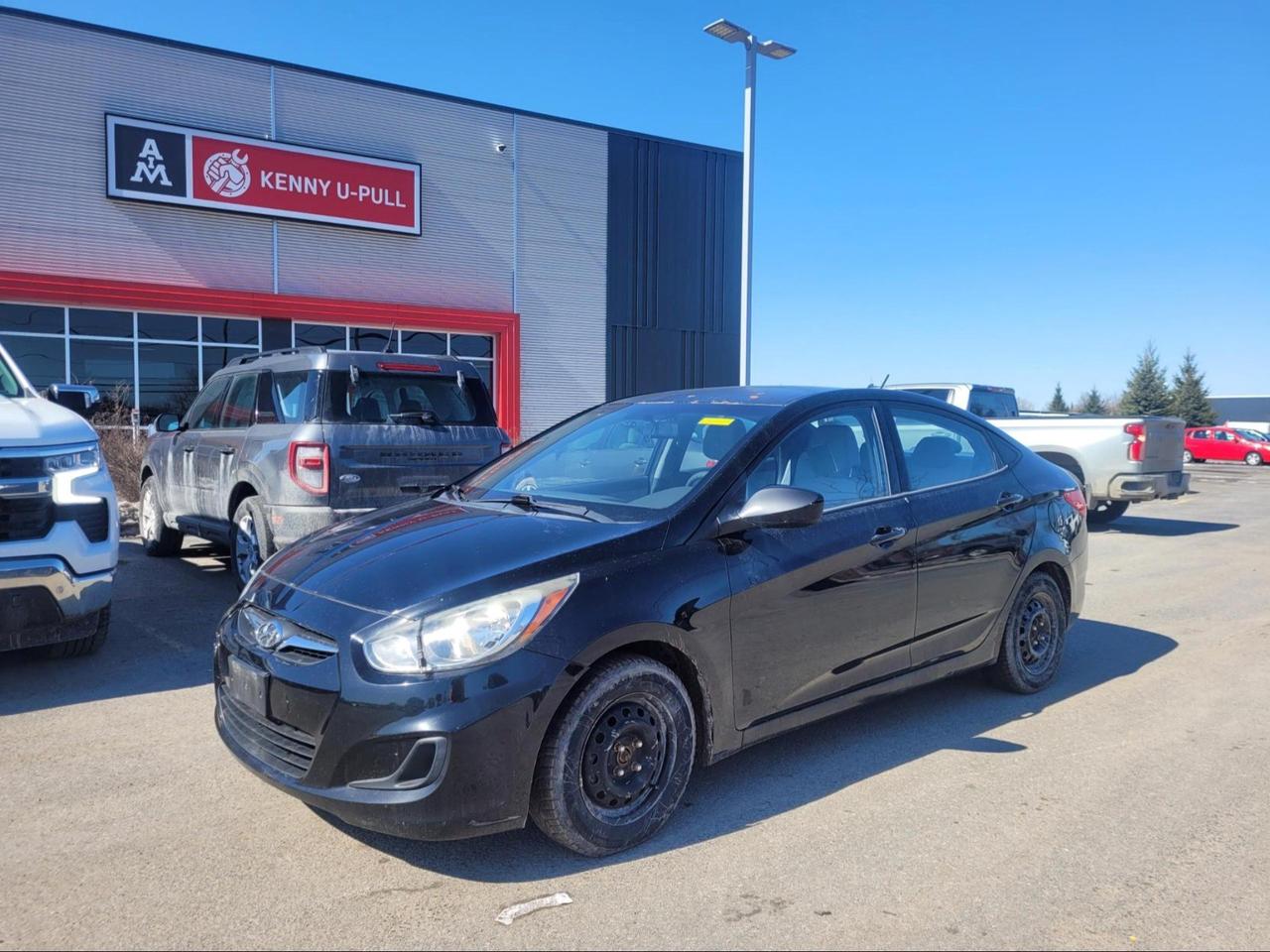 2012 Hyundai Accent in Ultra Black Pearl. The vehicle has 228,320km. The vehicle runs and drives ok. No check engine light. Some rust spots found around the vehicle. We dont perform any mechanical/safety inspections. The vehicle is sold as is and might need some work.