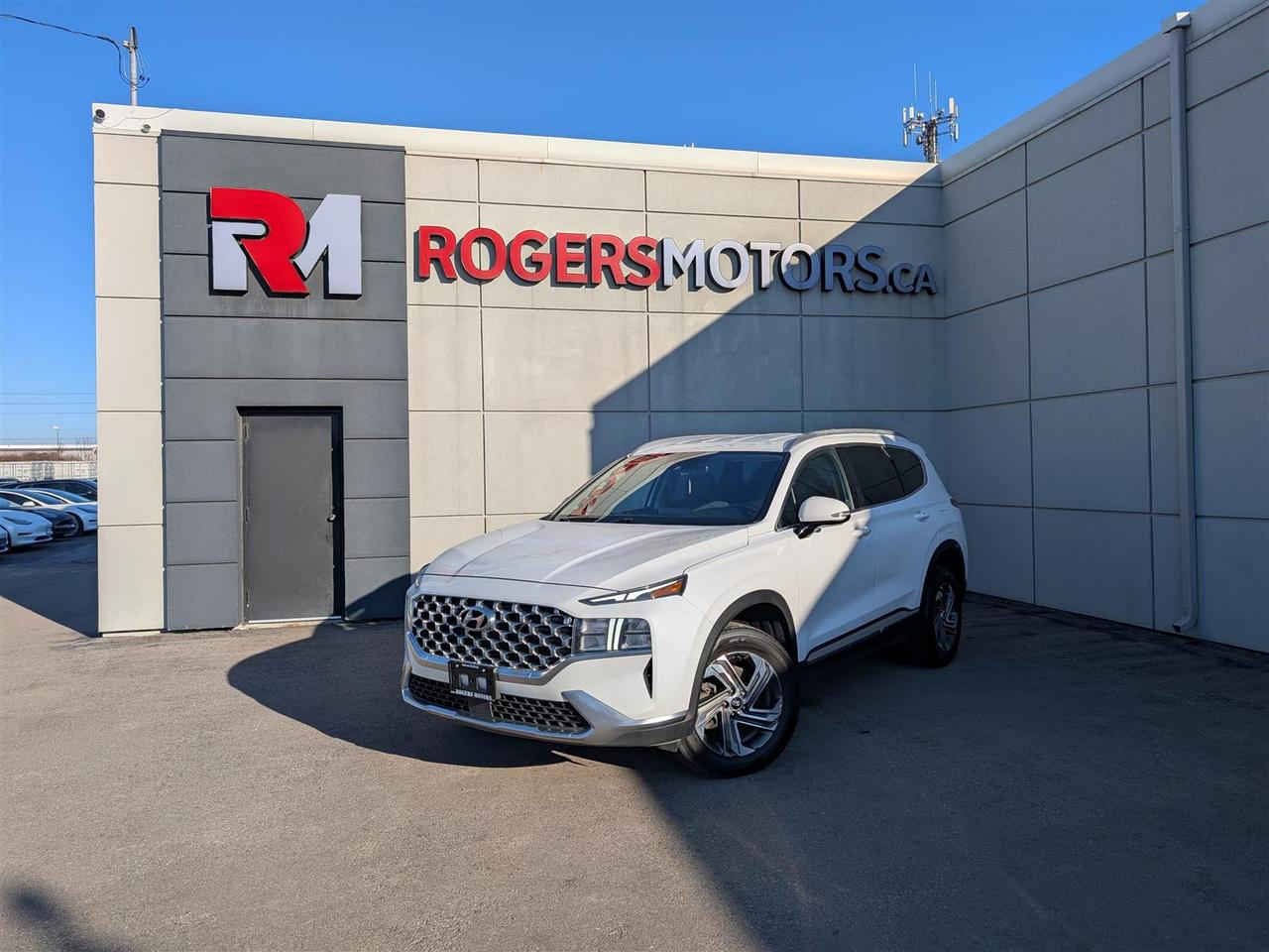 <p style=color: rgba(0, 0, 0, 0.87);text-align: left;>Limited Time Offer: Financing at 4.99% / 6 Months Payment Deferral / $0 Down Payment / Private Viewings Available / Appointments Preferred / Online Purchase and FREE Delivery Available / Curbside Pick Up Available<br/><br/></p><p style=color: rgba(0, 0, 0, 0.87);text-align: left;>CARPLAY / REVERSE CAMERA / LANE ASSIST / ADAPTIVE CRUISE CONTROL / BLINDSPOT ASSIST / BLUETOOTH / HEATED SEATS AND STEERING / REMOTE STARTER / And More...<br/><br/>While walk-ins are welcome, we encourage scheduling appointments for a smoother and more personalized experience.<br/><br/>This 2022 Hyundai Santa Fe Comes Loaded With All the Luxury Power Options Including, Power Windows, Power Locks, Power Mirrors, Heated Mirrors, Power Seats, Heated Seats, Bluetooth, Premium Sound System, Steering Wheel Controls, Telescoping Steering Wheel, Premium Alloy Rims, Smart Key Entry, Automatic Transmission, and so Much More! The Car Has Been Very Well Maintained! The Body and Interior are in Excellent Condition. Prices are subject to taxes, certification, and licensing. Trade-ins are welcomed.<br/><br/>Financing Available For All Credit Types Starting at 4.99% O.A.C. Up To 6 Months Payment Deferral Available. Our financing options cater to individuals with good, bad, or no credit history. Additionally, we offer up to 6 months with no payments and completely open loans with no early repayment fees. Our streamlined credit application process ensures quick approvals. Same-day delivery options are also accessible.<br/><br/>Our state-of-the-art 10,000 square foot auto service center is staffed with licensed mechanics and is open to the public. From routine maintenance like oil changes and brake services to major repairs such as engine replacements, our service center caters to all automotive needs. Loaner vehicles are available for extended service requirements.<br/><br/>We are Oakvilles premier destination for rust proofing services. Schedule an appointment to protect your vehicle from corrosion.<br/><br/>Experience Excellence at Rogers Motors. Rogers Motors proudly stands as Oakvilles largest used car dealership, renowned for providing top-quality used vehicles including cars, trucks, SUVs, and minivans. Family-owned and operated since 2004, with over 10,000 vehicles sold, we are committed to delivering exceptional service.<br/><br/>At Rogers Motors, we prioritize customer satisfaction above all else. With a focus on love, honesty, integrity, and transparency, we strive to ensure that every guest leaves our dealership happier than when they arrived. With an average rating of 4.9/5 from over 1000 online reviews, we invite you to experience car shopping and service the way it should be.<br/><br/>Rogers Motors. Driving Happiness.<br/>Visit our website to see all our current inventory.</p>