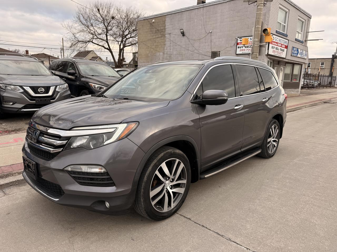 2017 Honda Pilot 4WD 4dr Touring Photo2
