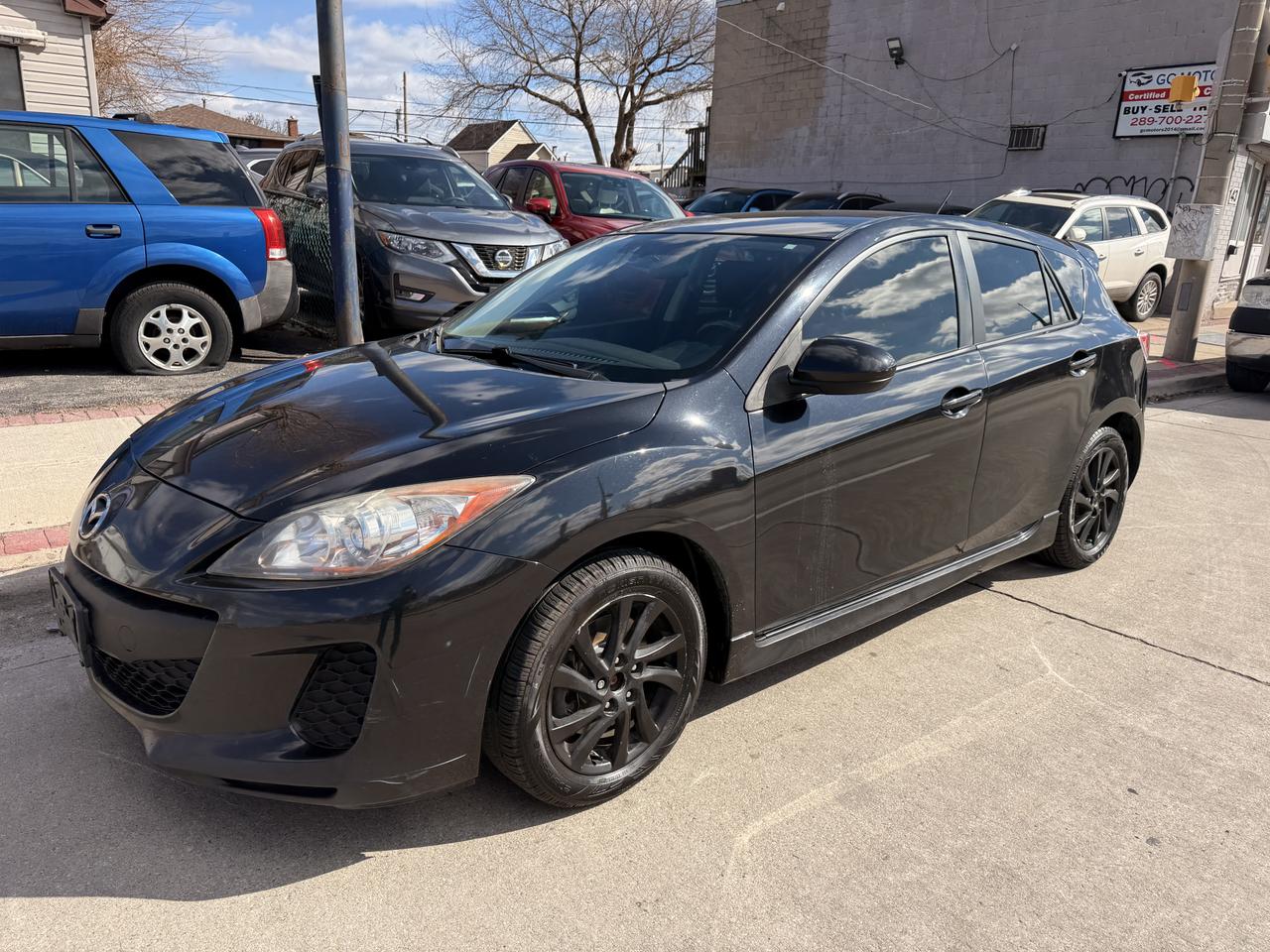 2012 Mazda MAZDA3 4dr HB Sport Man GS *Ltd Avail* Photo1
